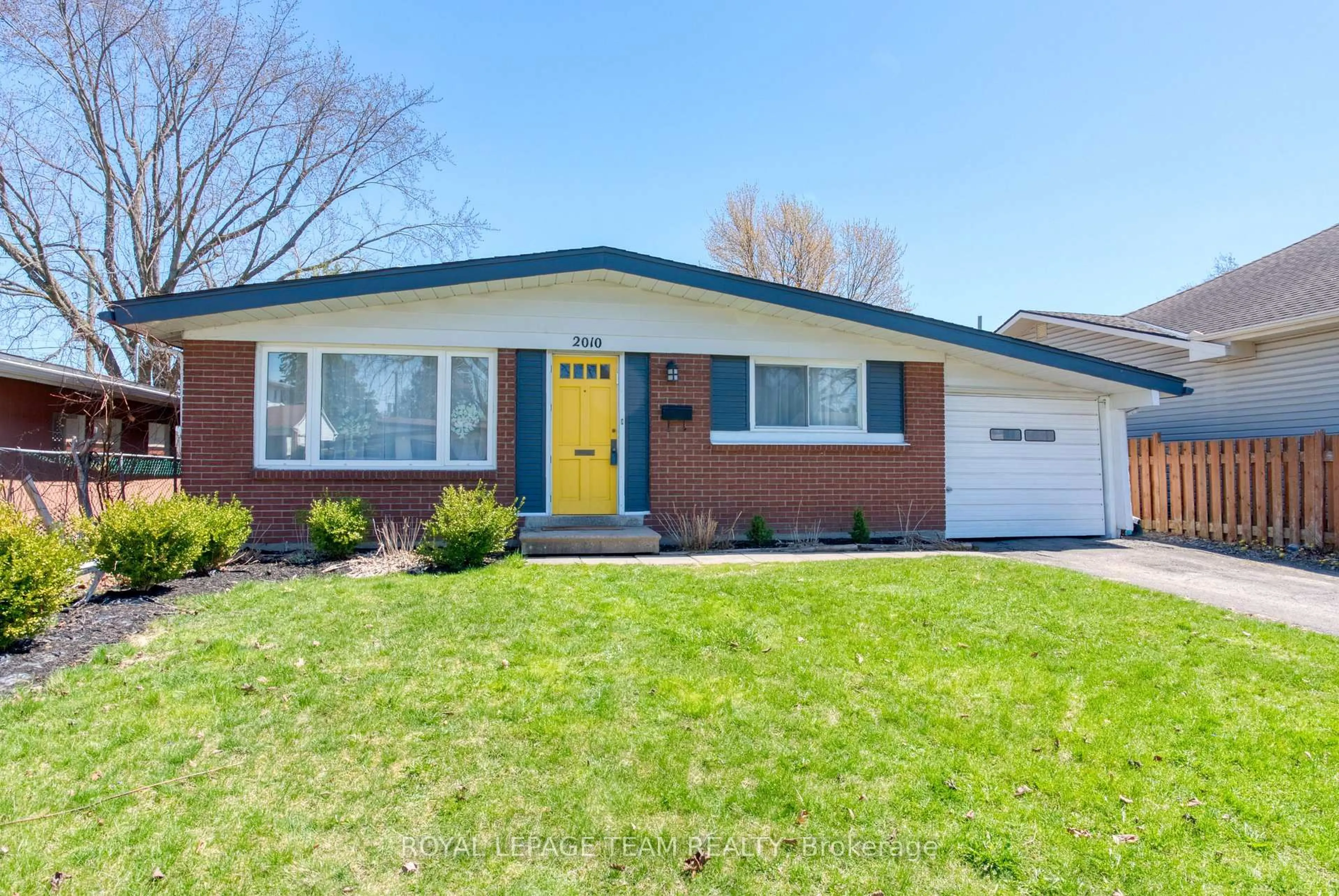 Home with brick exterior material, street for 2010 Featherston Dr, Ottawa Ontario K1H 6P9