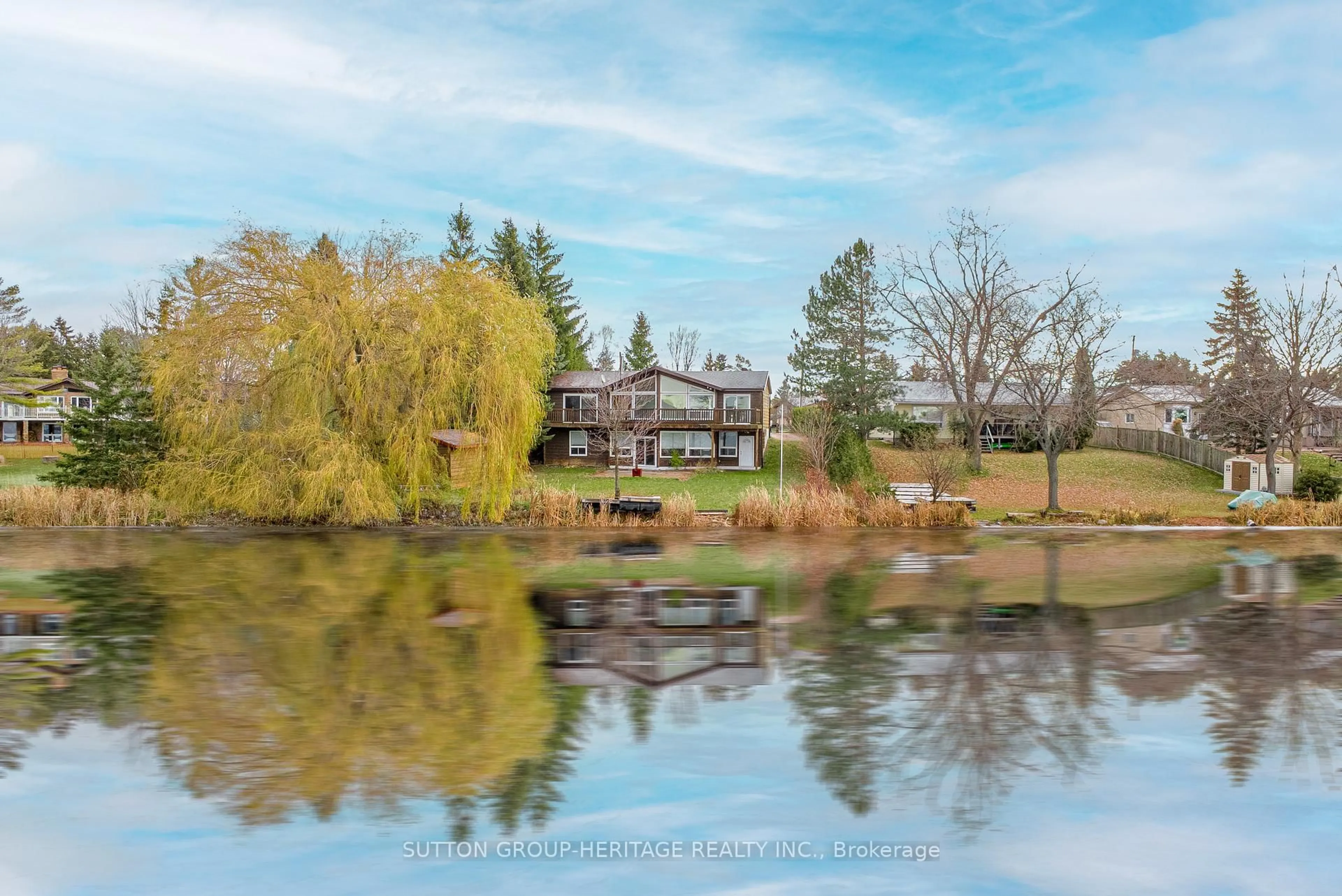 A pic from outside/outdoor area/front of a property/back of a property/a pic from drone, water/lake/river/ocean view for 24 Pleasant View Cres, Kawartha Lakes Ontario K0M 2C0