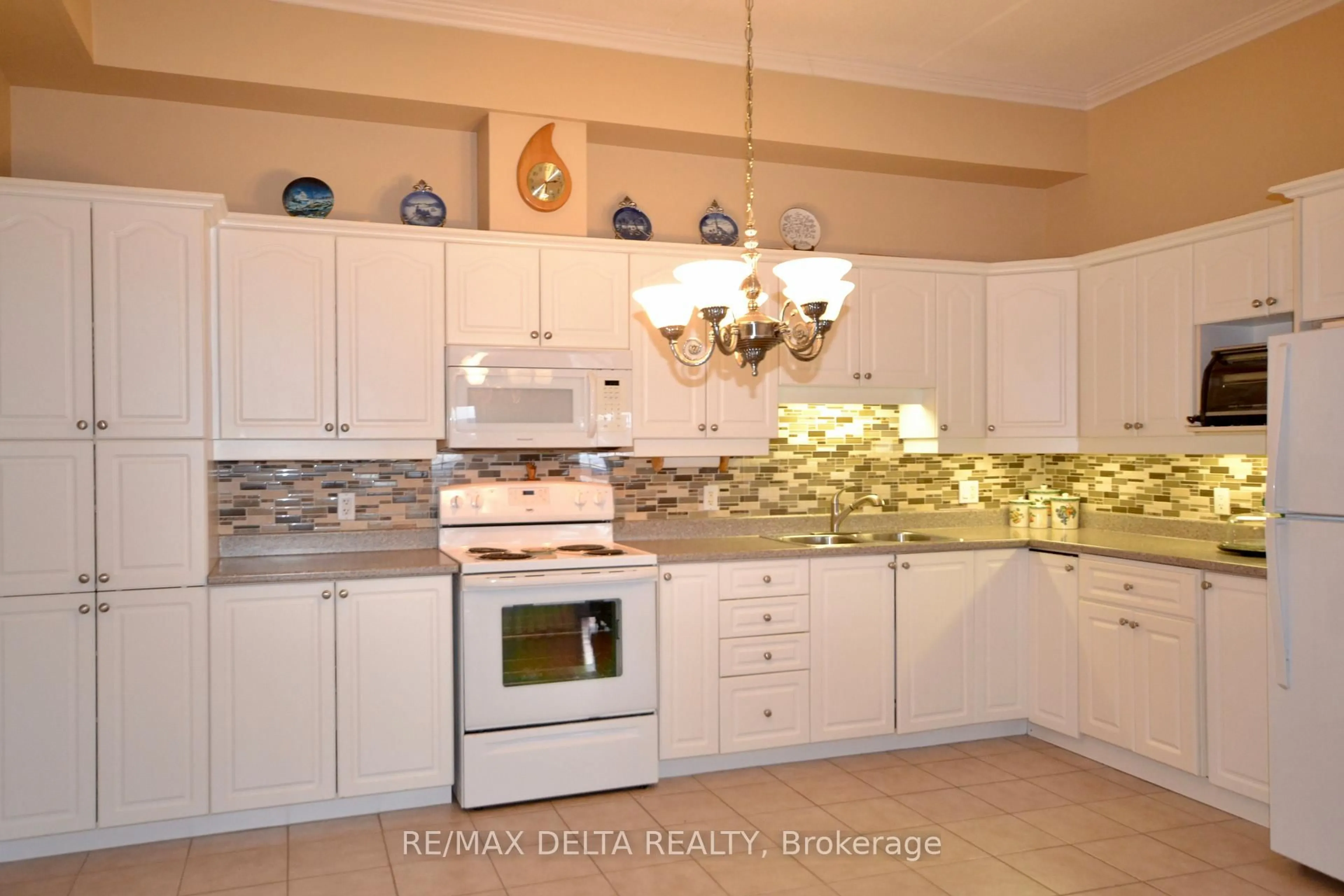 Open concept kitchen, ceramic/tile floor for 2921 Laurier St #407, Clarence-Rockland Ontario K4K 1V2