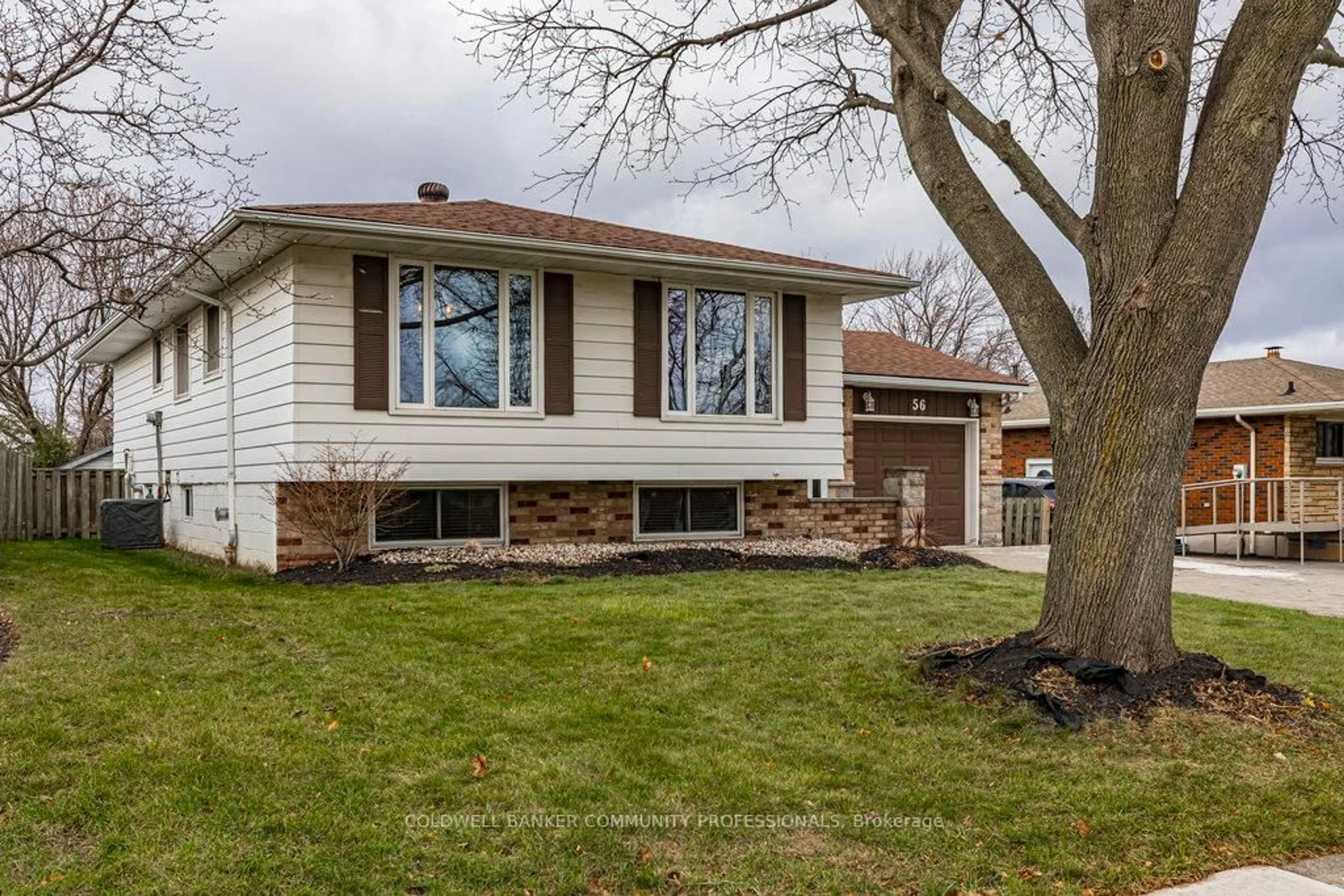 Home with vinyl exterior material, street for 56 Elgar Ave, Hamilton Ontario L9C 4E1