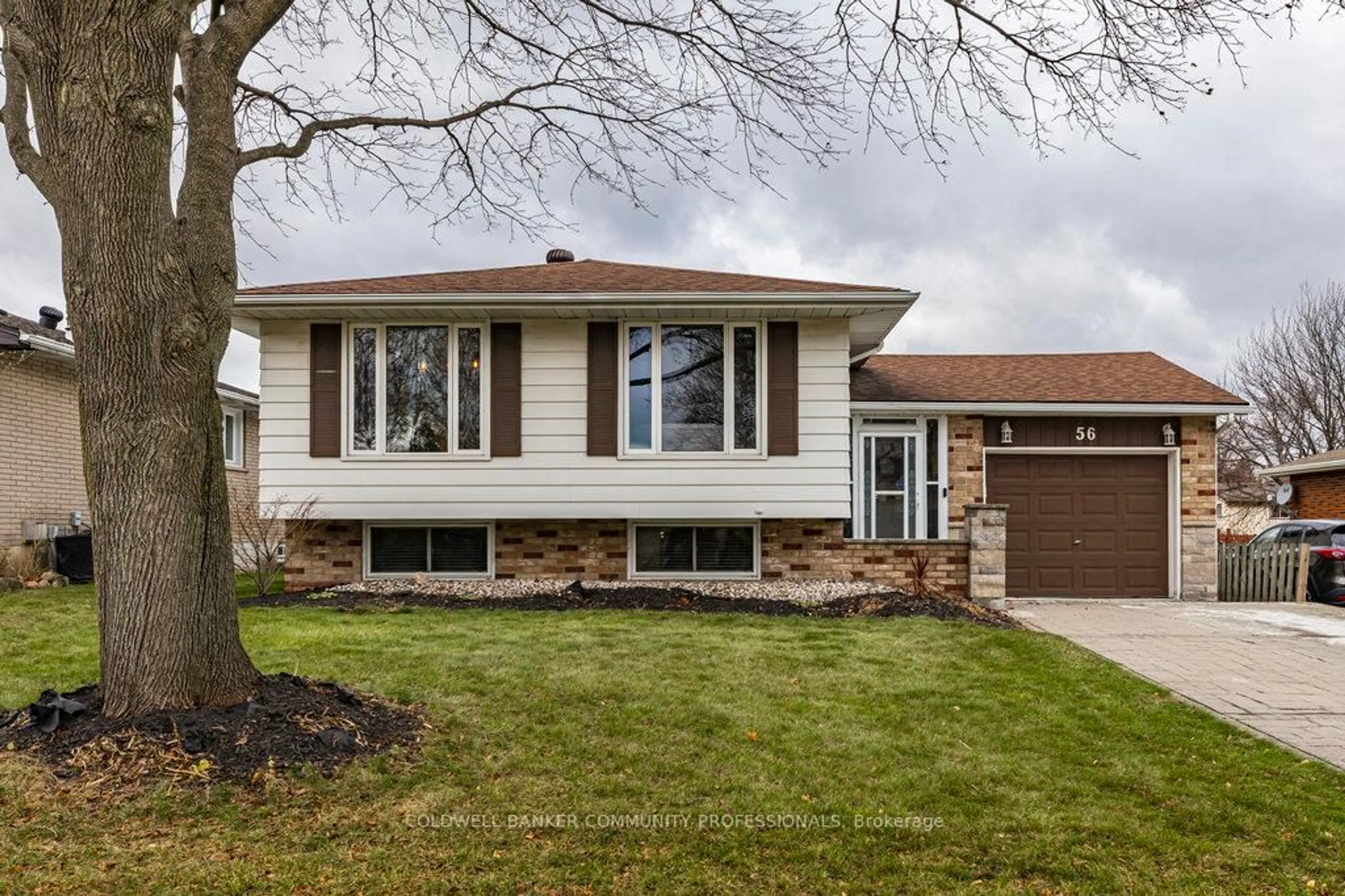 Home with vinyl exterior material, street for 56 Elgar Ave, Hamilton Ontario L9C 4E1