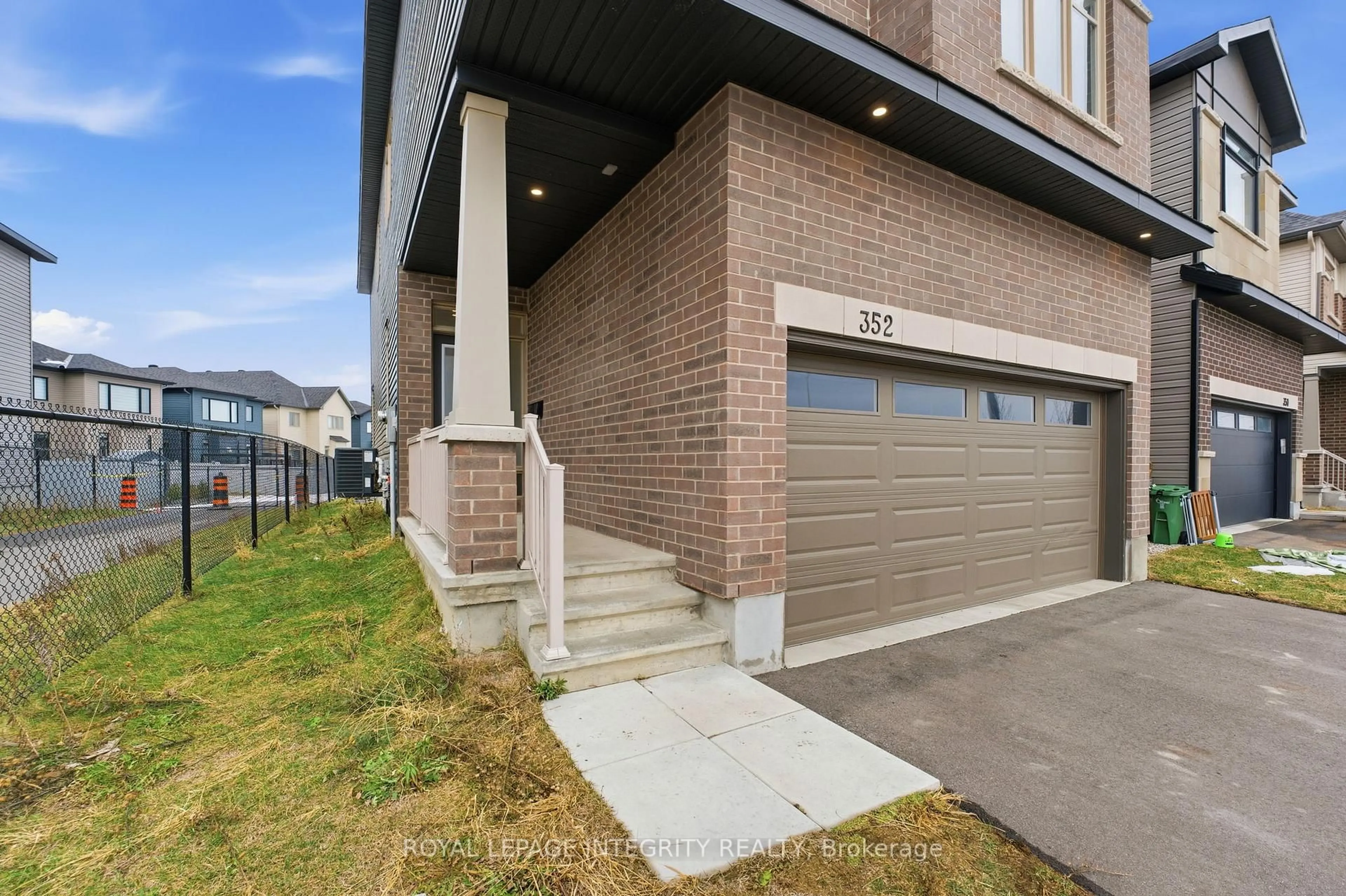 Home with brick exterior material, street for 352 Monticello Ave, Stittsville Ontario K2S 2S5