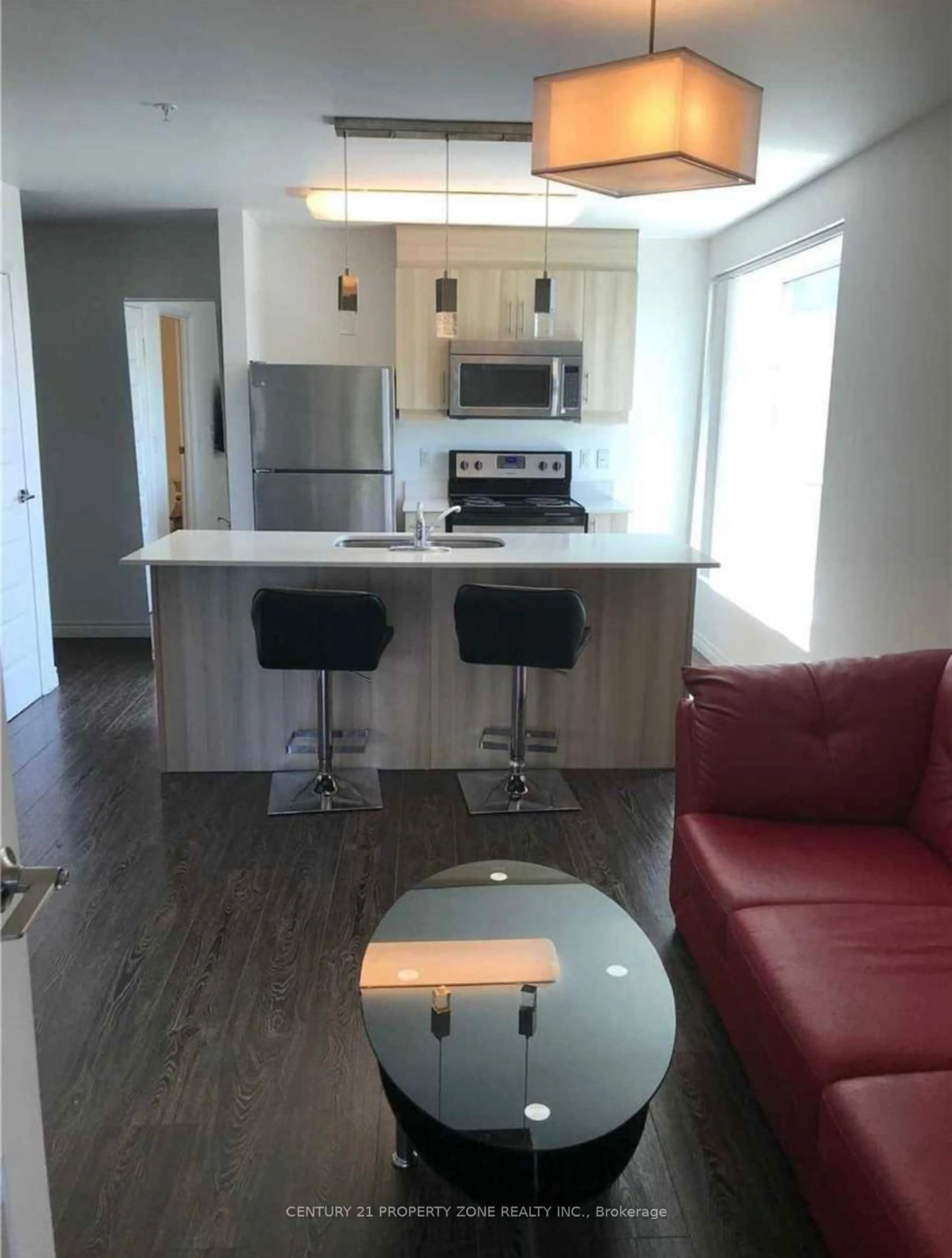 Open concept kitchen, wood/laminate floor for 158 King St #307, Waterloo Ontario N2J 2Y2