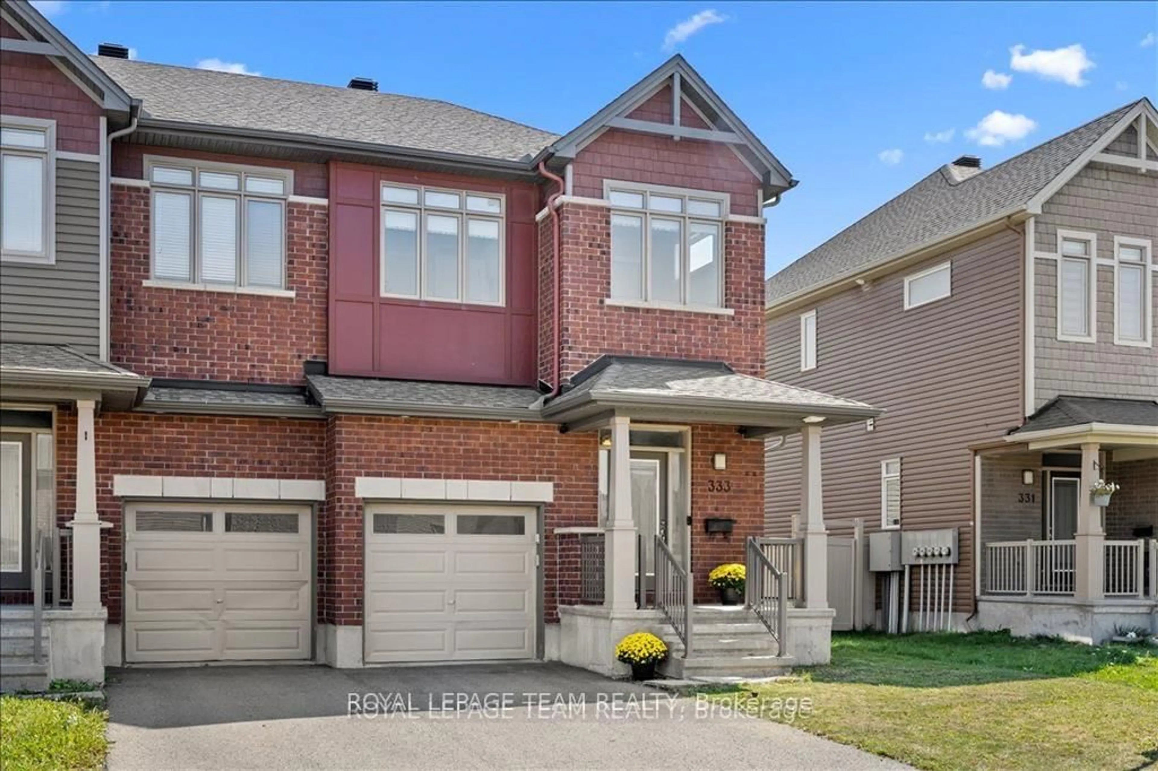Home with brick exterior material, street for 333 Tulum Cres, Ottawa Ontario K2S 0V9