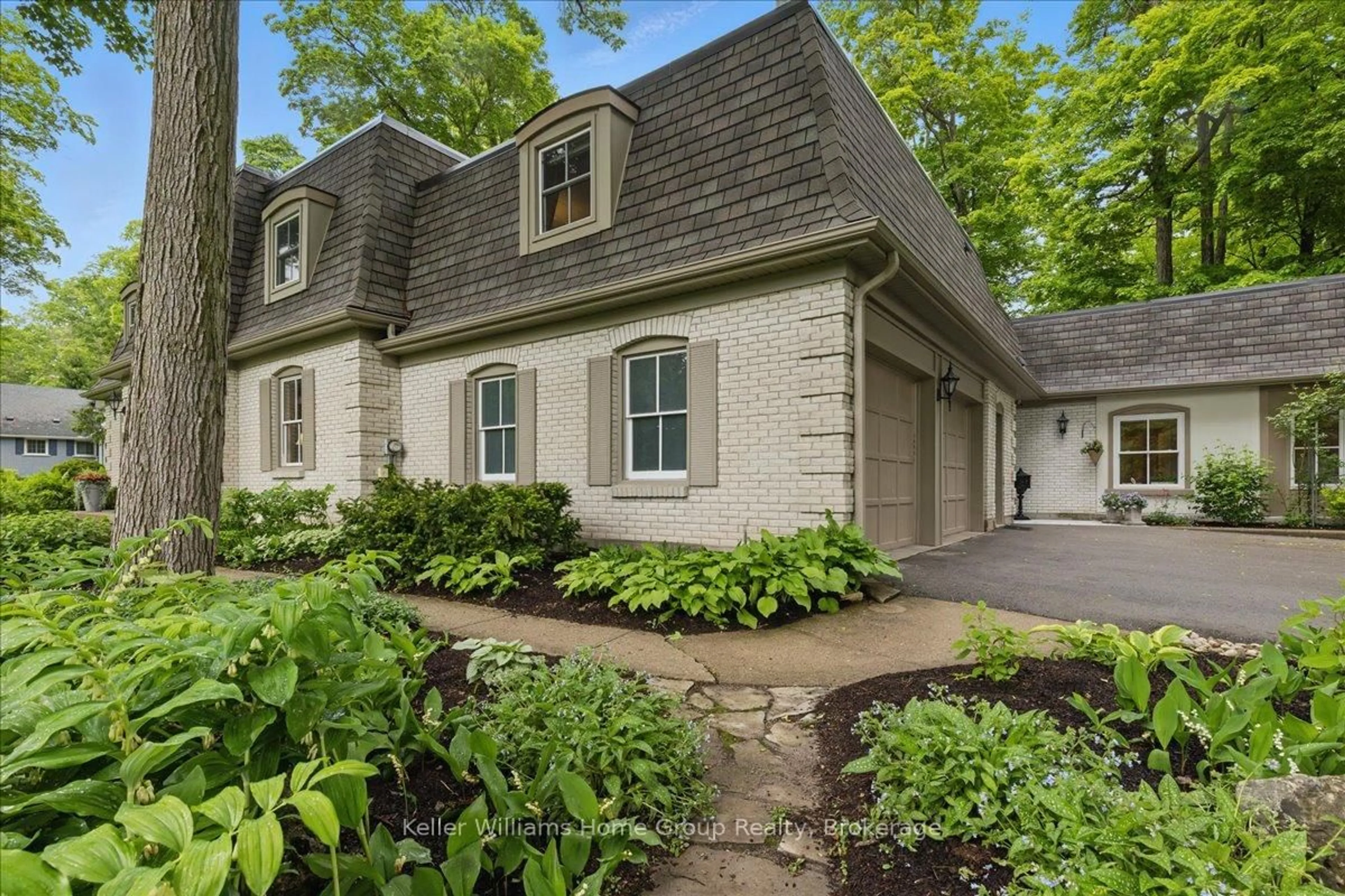 Home with brick exterior material, street for 348 Old Stone Rd, Waterloo Ontario N2K 1Z3