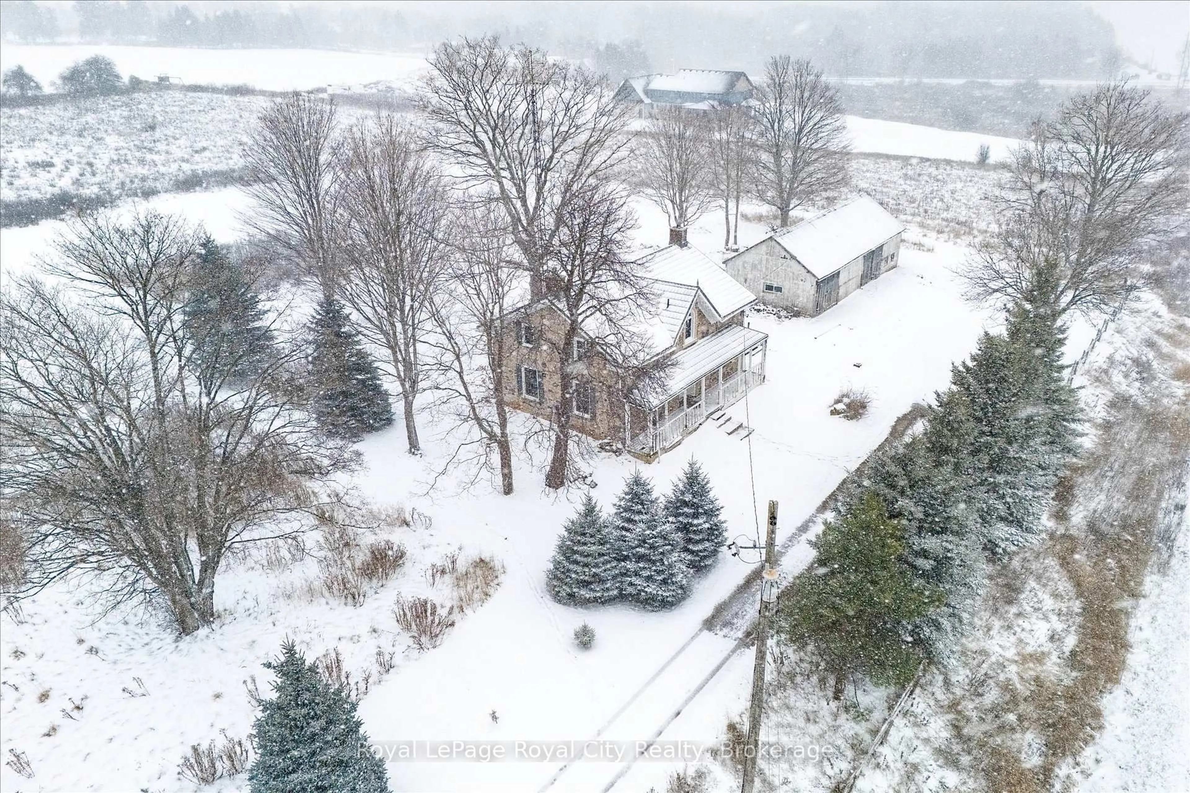 A pic from outside/outdoor area/front of a property/back of a property/a pic from drone, unknown for 5877 Highway 6 Rd, Centre Wellington Ontario N1H 6J2