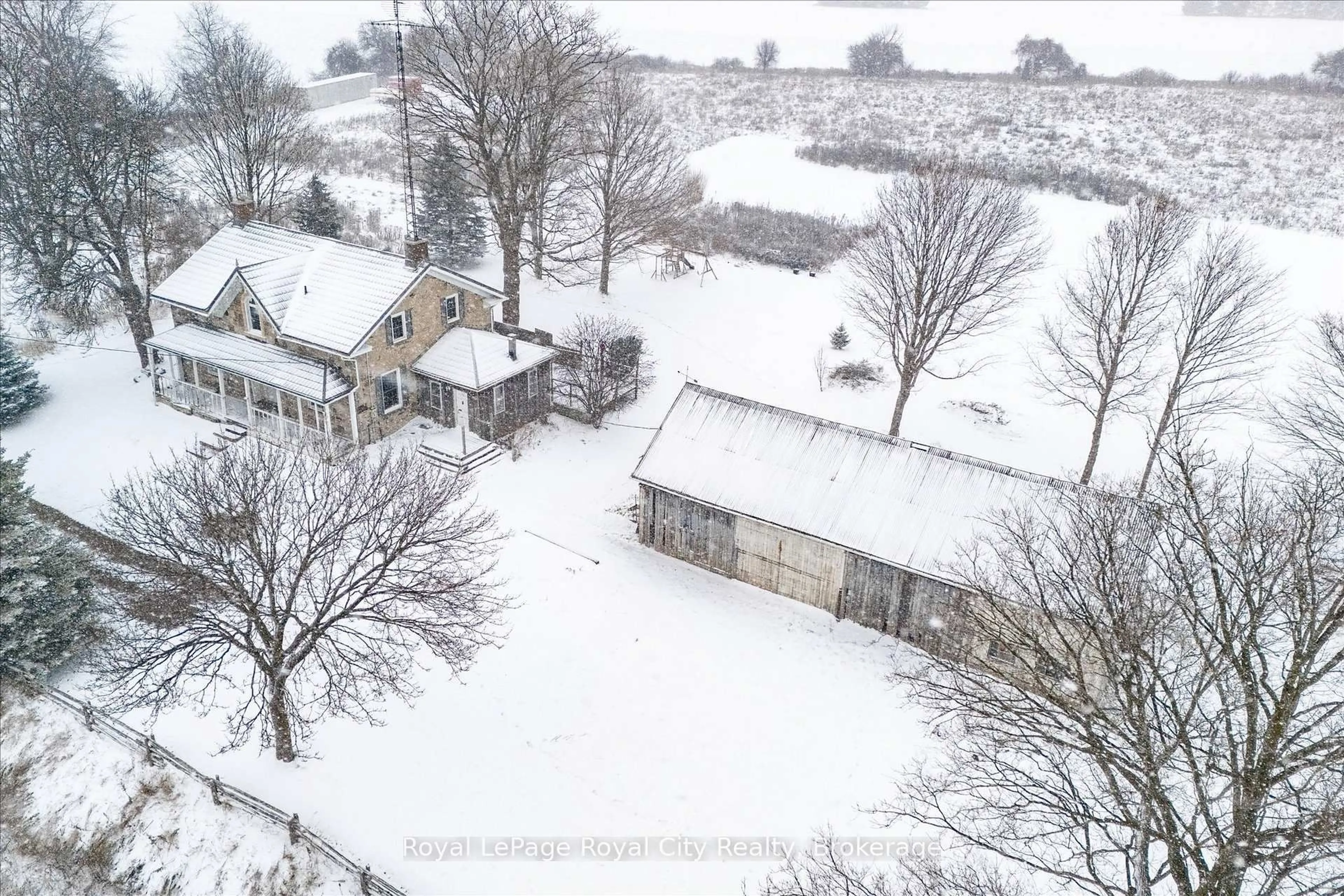 A pic from outside/outdoor area/front of a property/back of a property/a pic from drone, street for 5877 Highway 6 Rd, Centre Wellington Ontario N1H 6J2