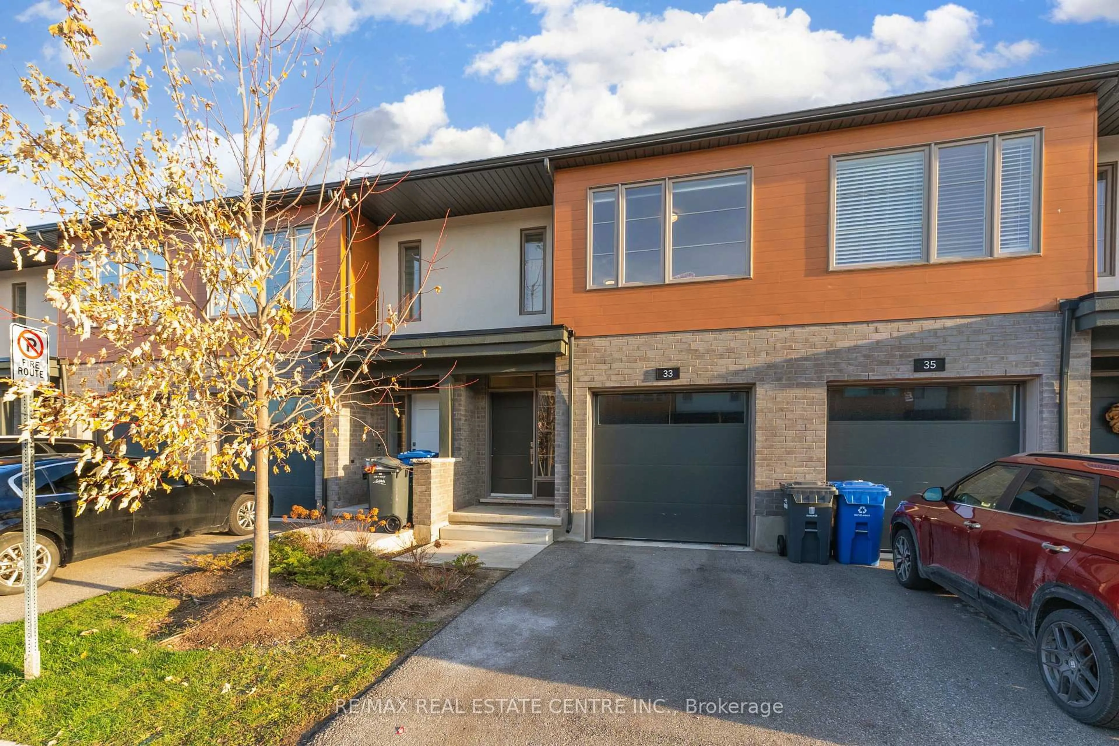 Home with brick exterior material, street for 33 Steele Cres, Guelph Ontario N1E 0S7