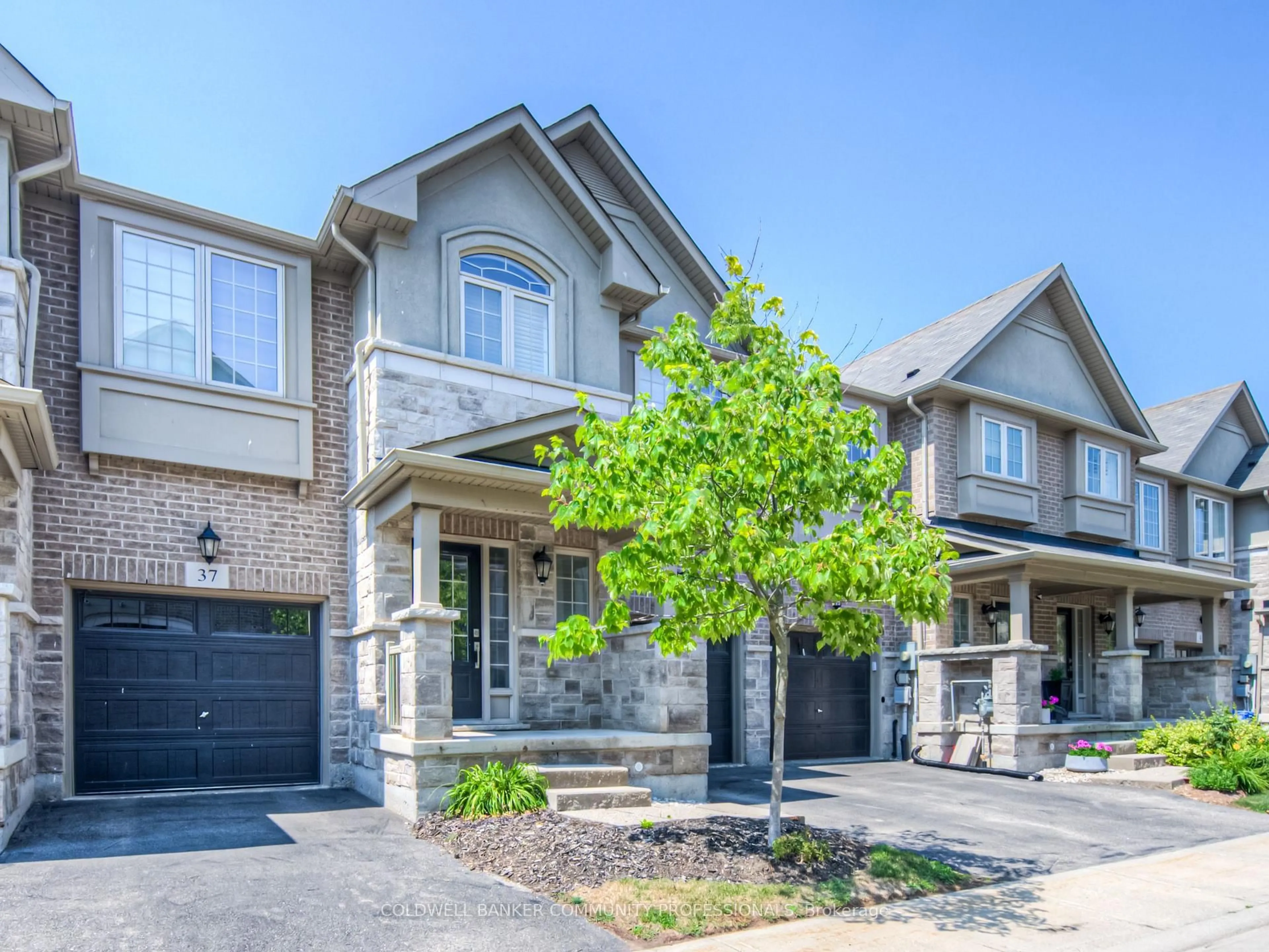 Home with brick exterior material, street for 215 Dundas St #38, Hamilton Ontario L8B 0X1