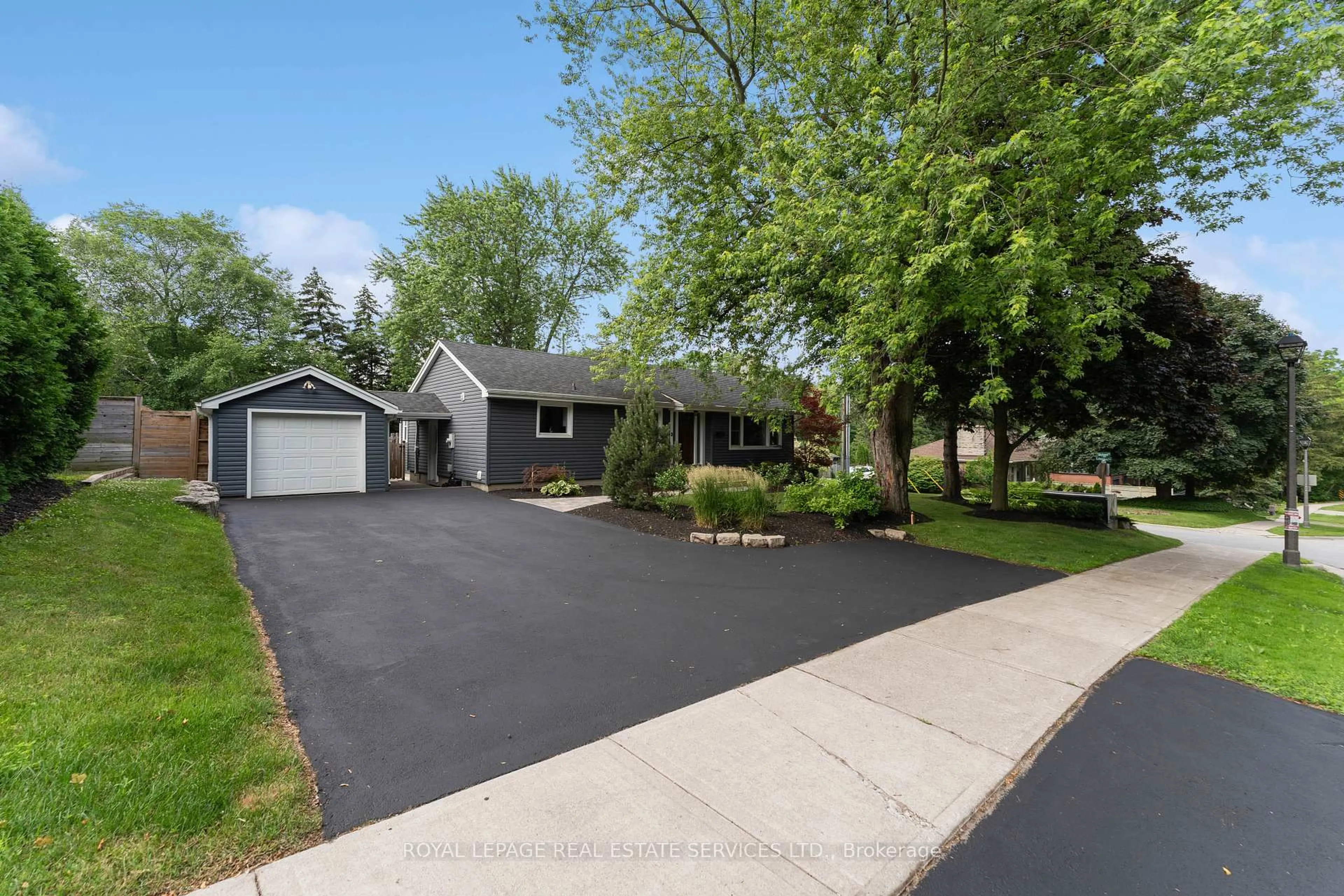 Home with vinyl exterior material, street for 136 Mohawk Rd, Hamilton Ontario L9G 2W9