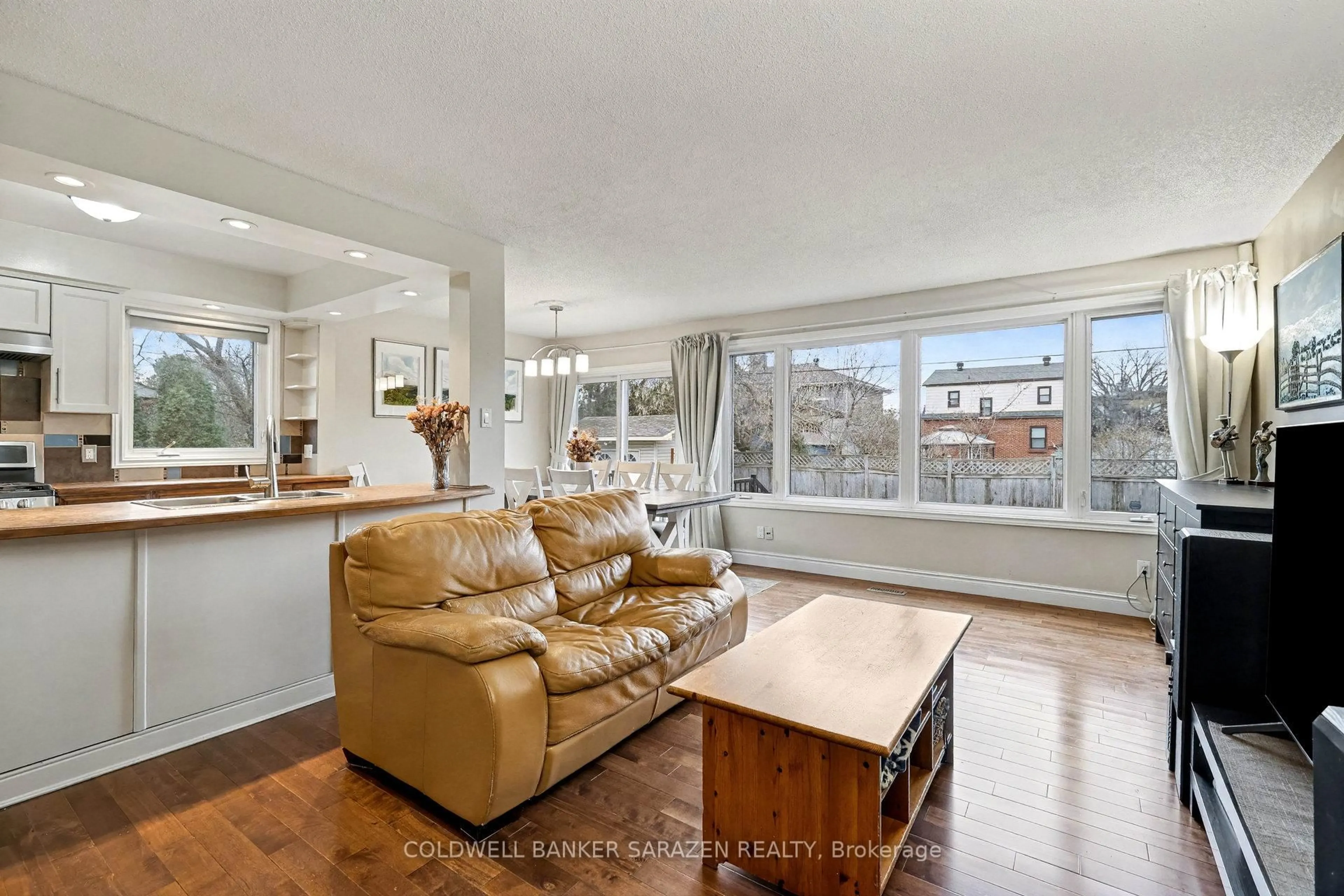 Living room with furniture, wood/laminate floor for 868 Duberry St, Ottawa Ontario K2A 3T3