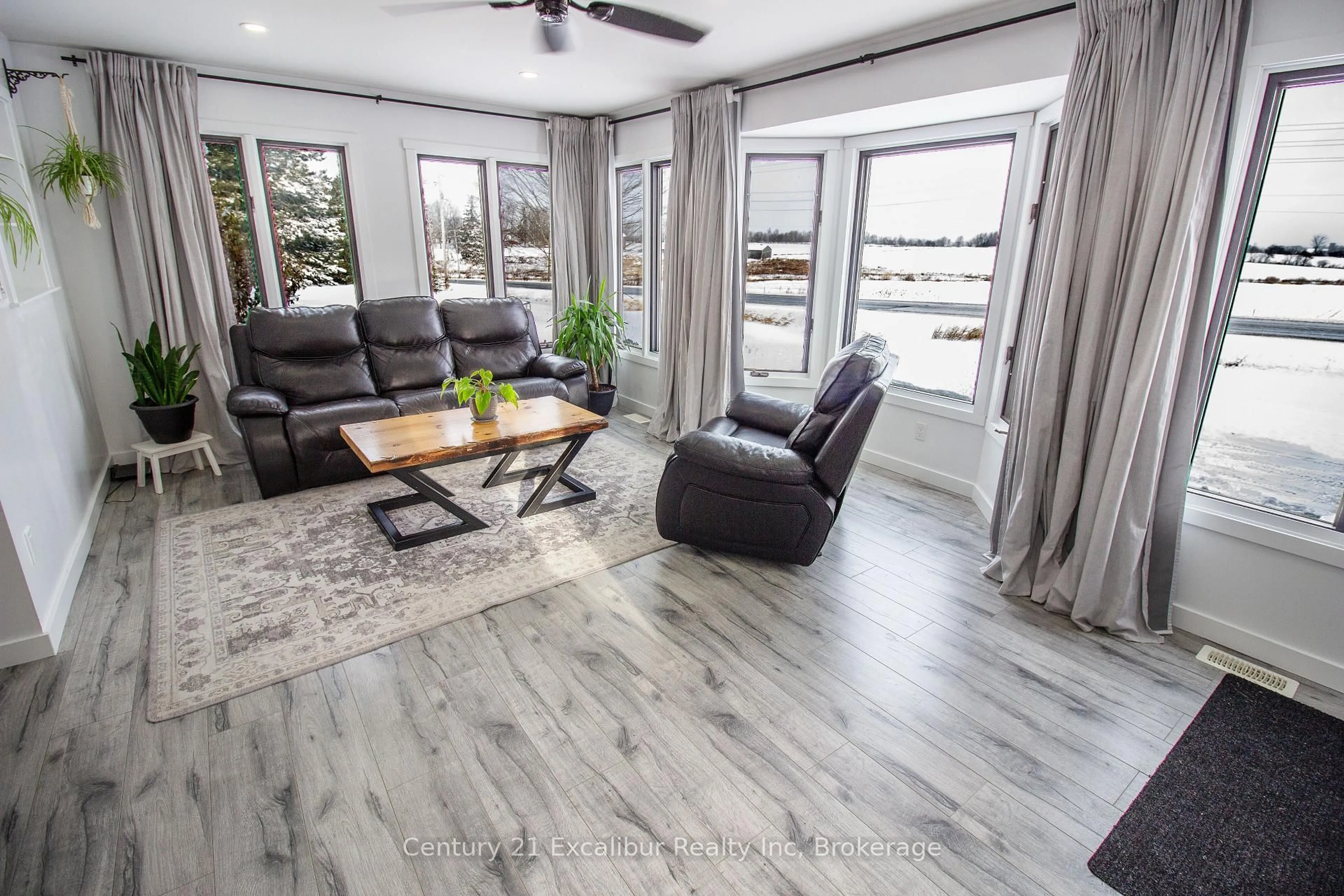 Living room with furniture, wood/laminate floor for 6306 WELLINGTON RD 29 Rd, Centre Wellington Ontario N1M 2W5