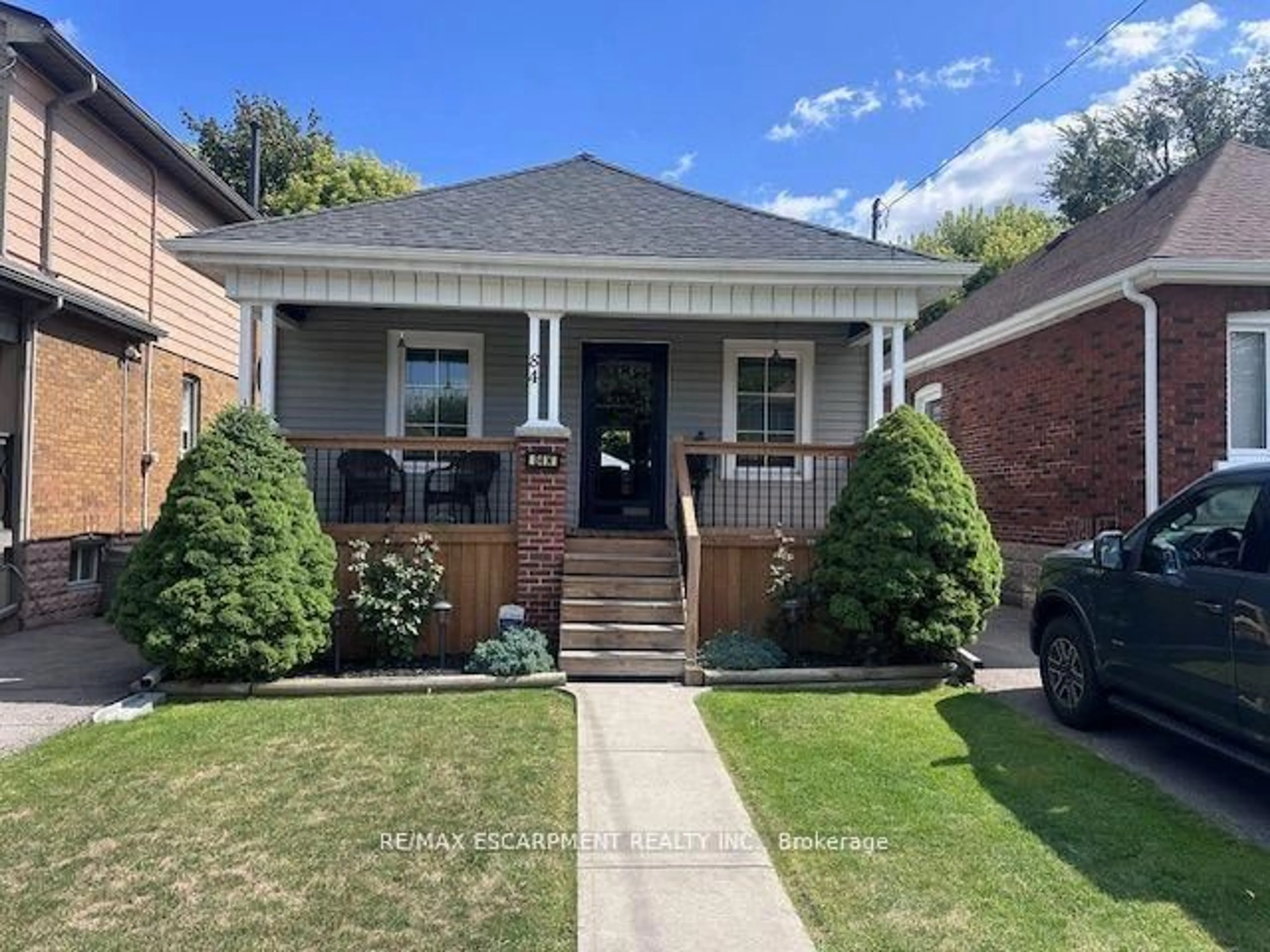 Home with brick exterior material, street for 84 Barons Ave, Hamilton Ontario L8H 5A4