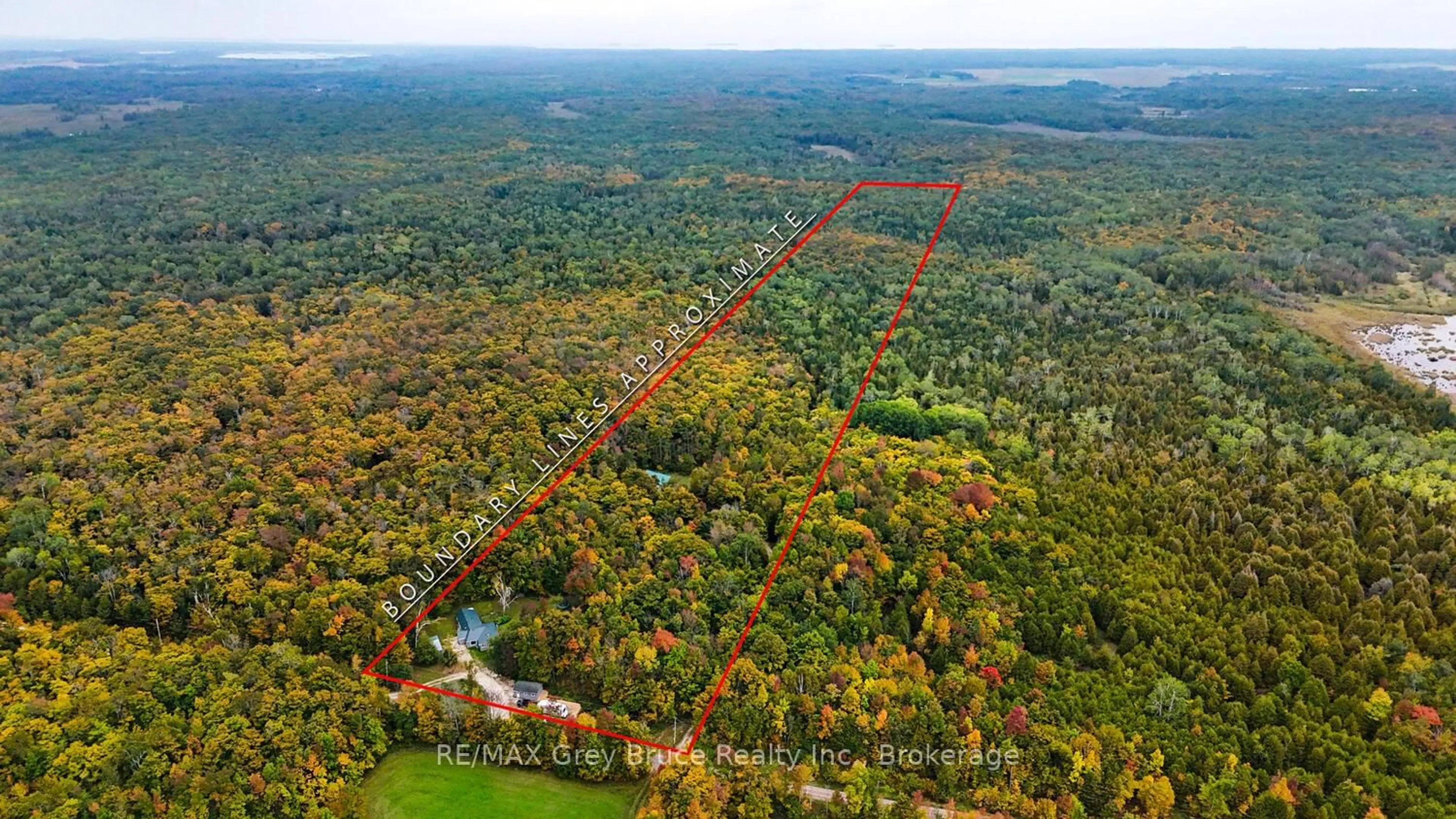 A pic from outside/outdoor area/front of a property/back of a property/a pic from drone, forest/trees view for 217 Kings Cres, South Bruce Peninsula Ontario N0H 2T0