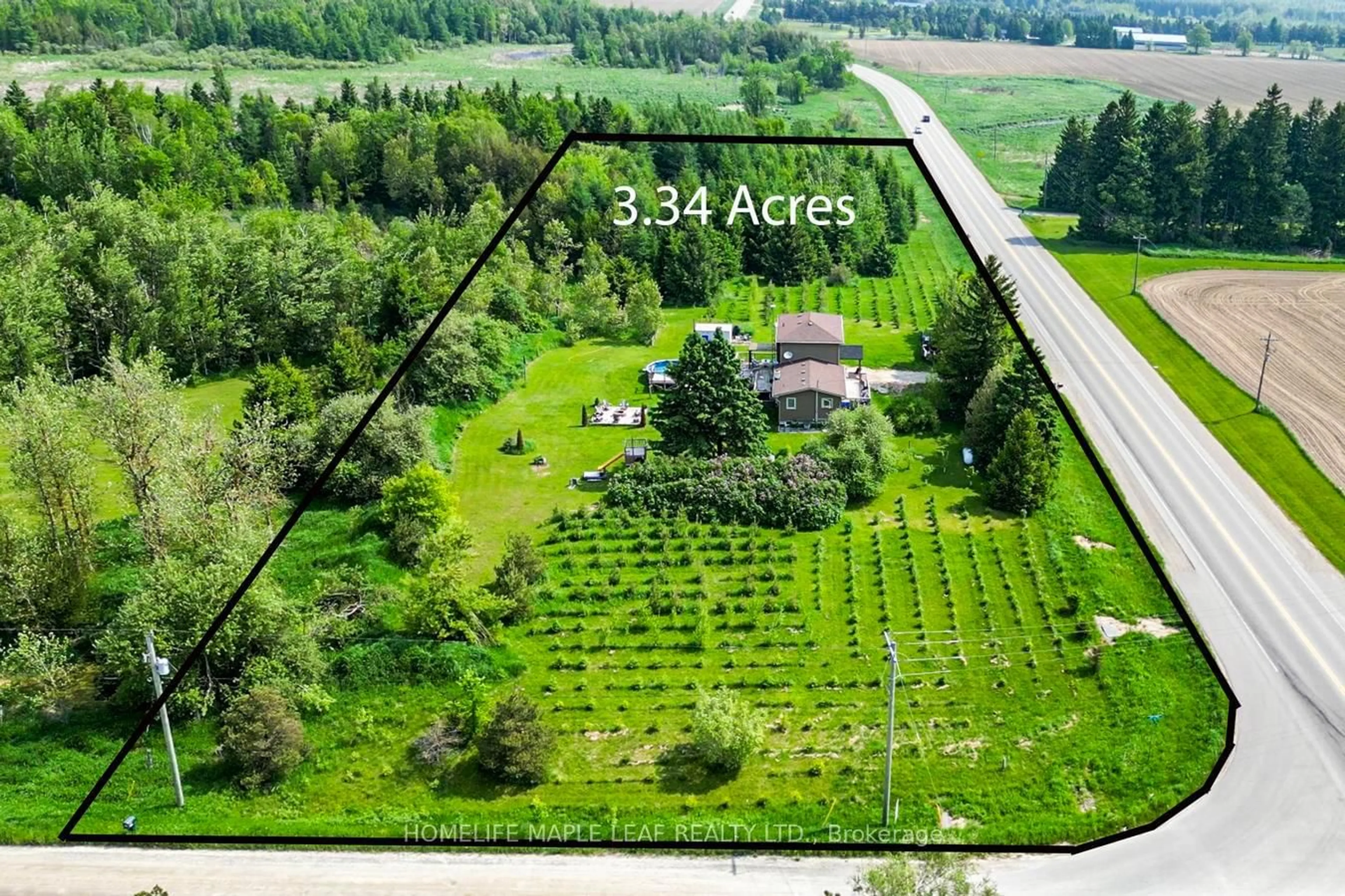 A pic from outside/outdoor area/front of a property/back of a property/a pic from drone, forest/trees view for 64149 County Road 3, East Garafraxa Ontario L9W 7J4