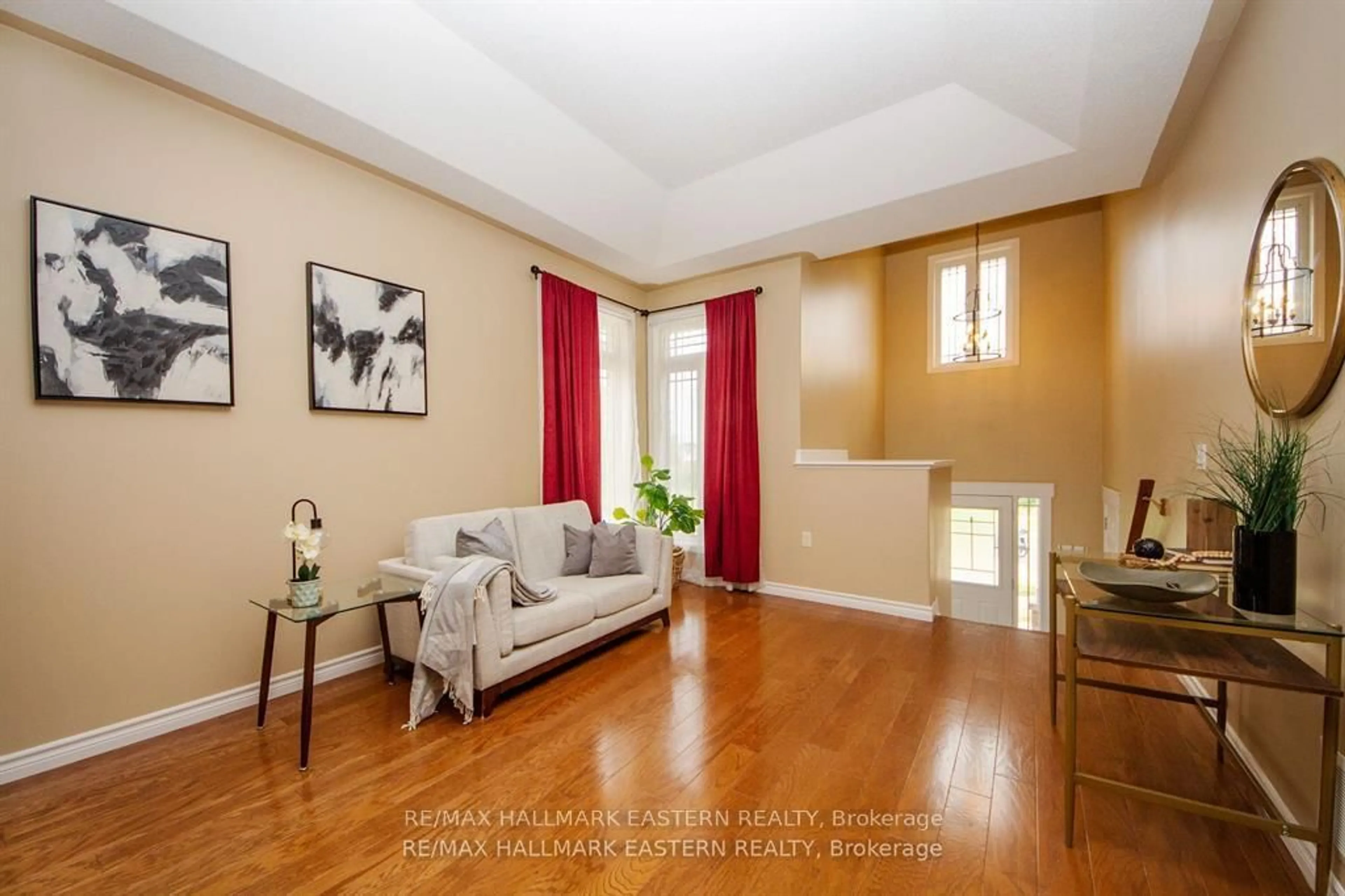 Living room with furniture, wood/laminate floor for 1568 Ireland Dr, Peterborough Ontario K9K 2T2