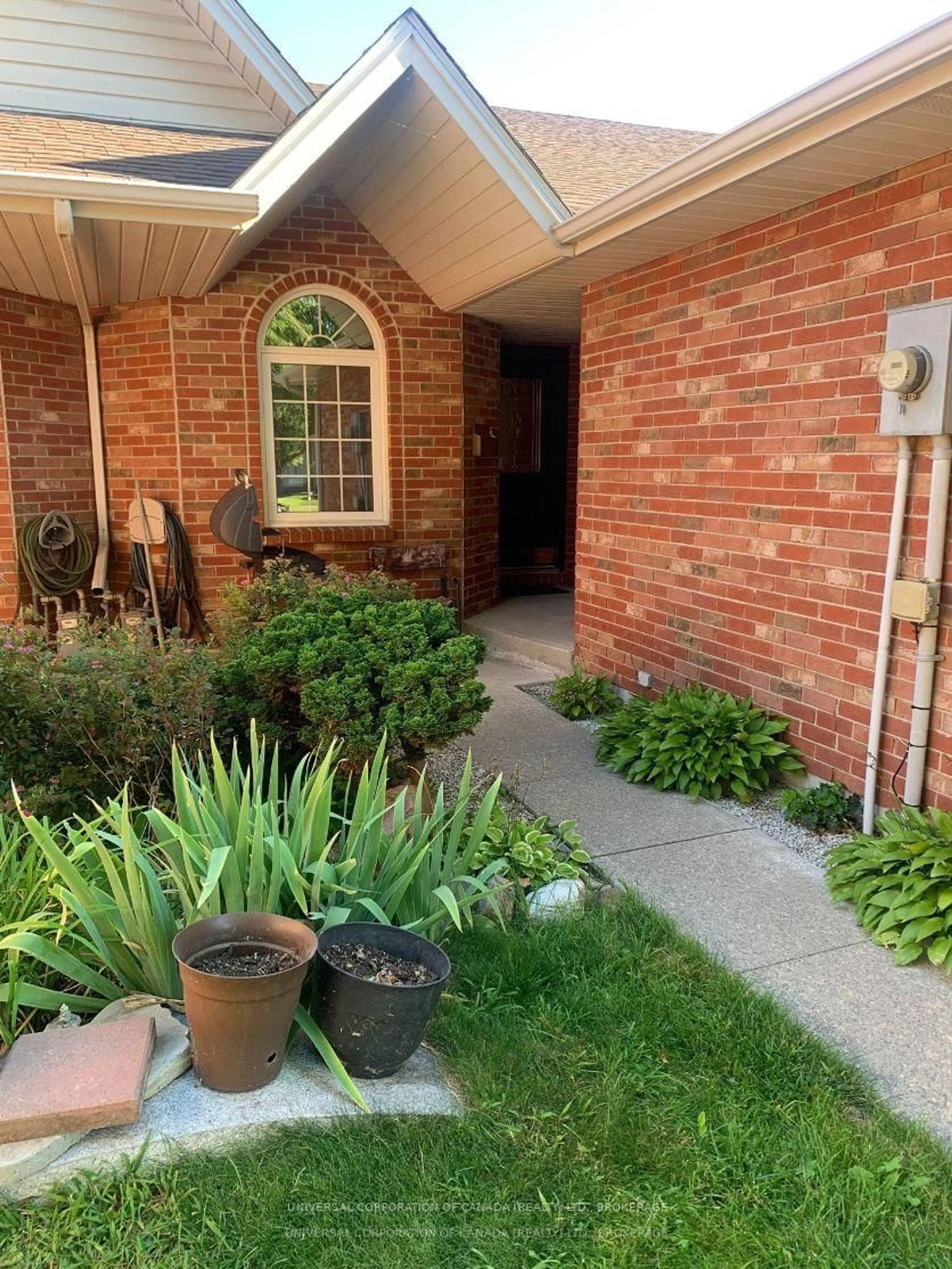 Home with brick exterior material, street for 67 Foundry St, Leamington Ontario N8H 1C5