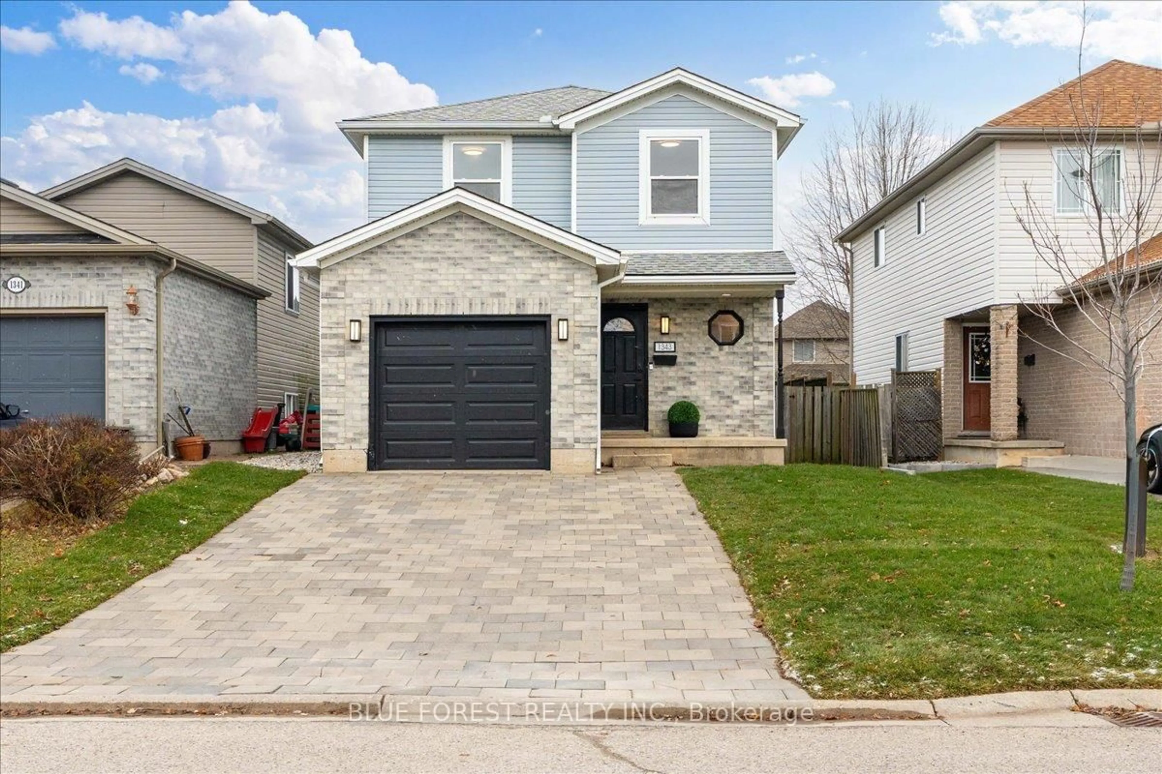 Home with brick exterior material, street for 1343 Aspenridge Cres, London East Ontario N5Y 5N2