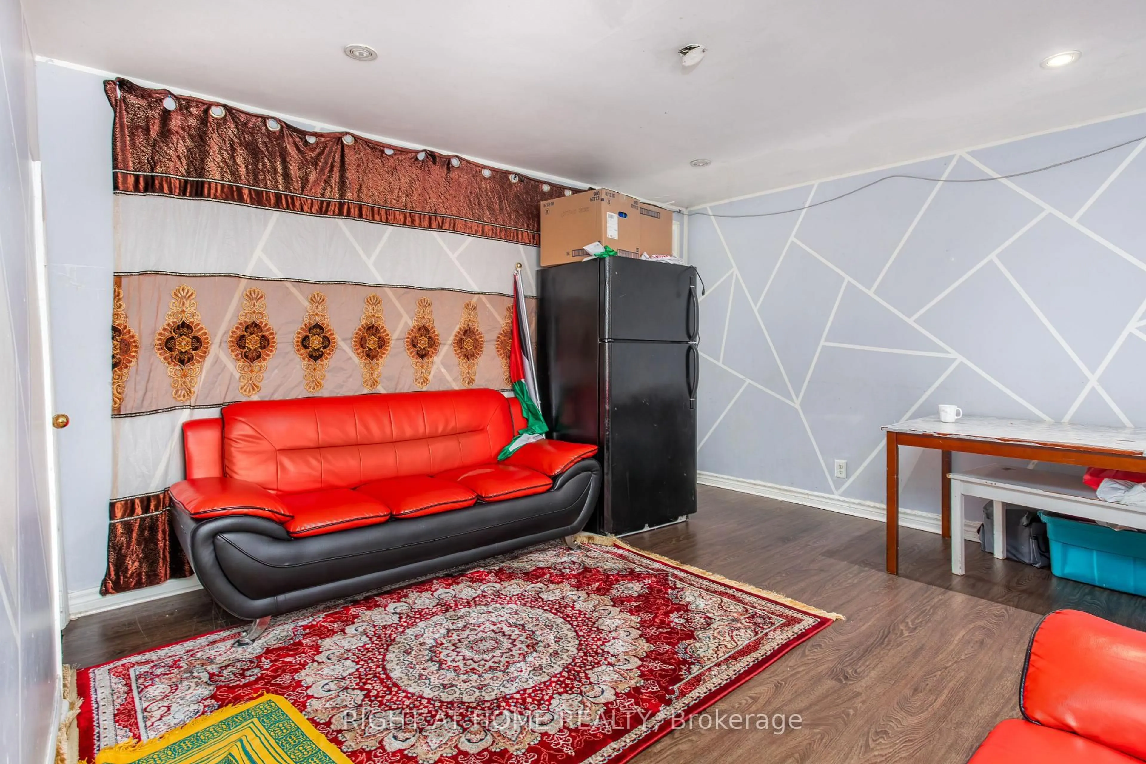 Living room with furniture, carpet floor for 175-177 Wilson St, Hamilton Ontario L8R 1E3