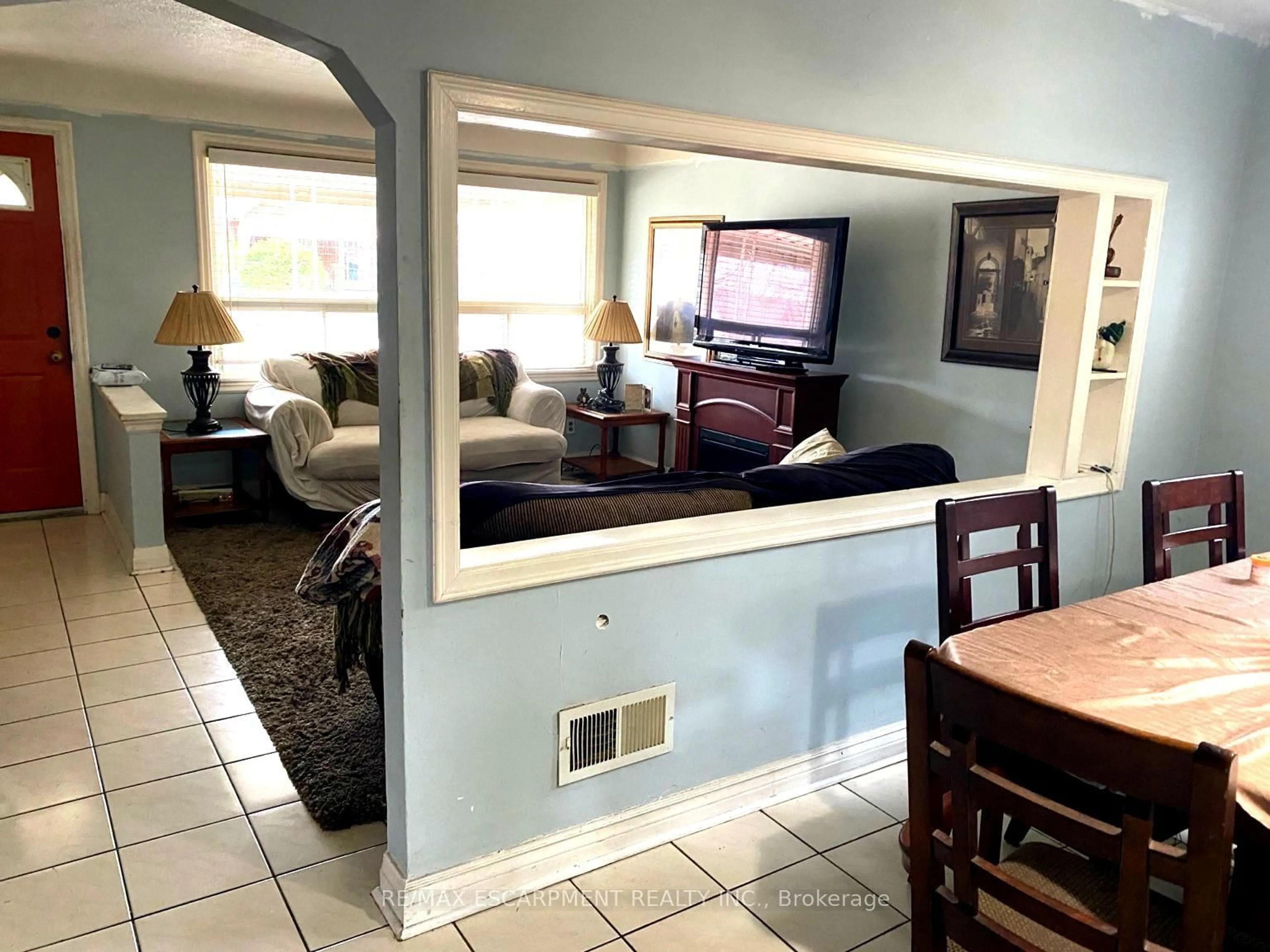 Living room with furniture, ceramic/tile floor for 140 Stewartdale Ave, Hamilton Ontario L8K 4P5