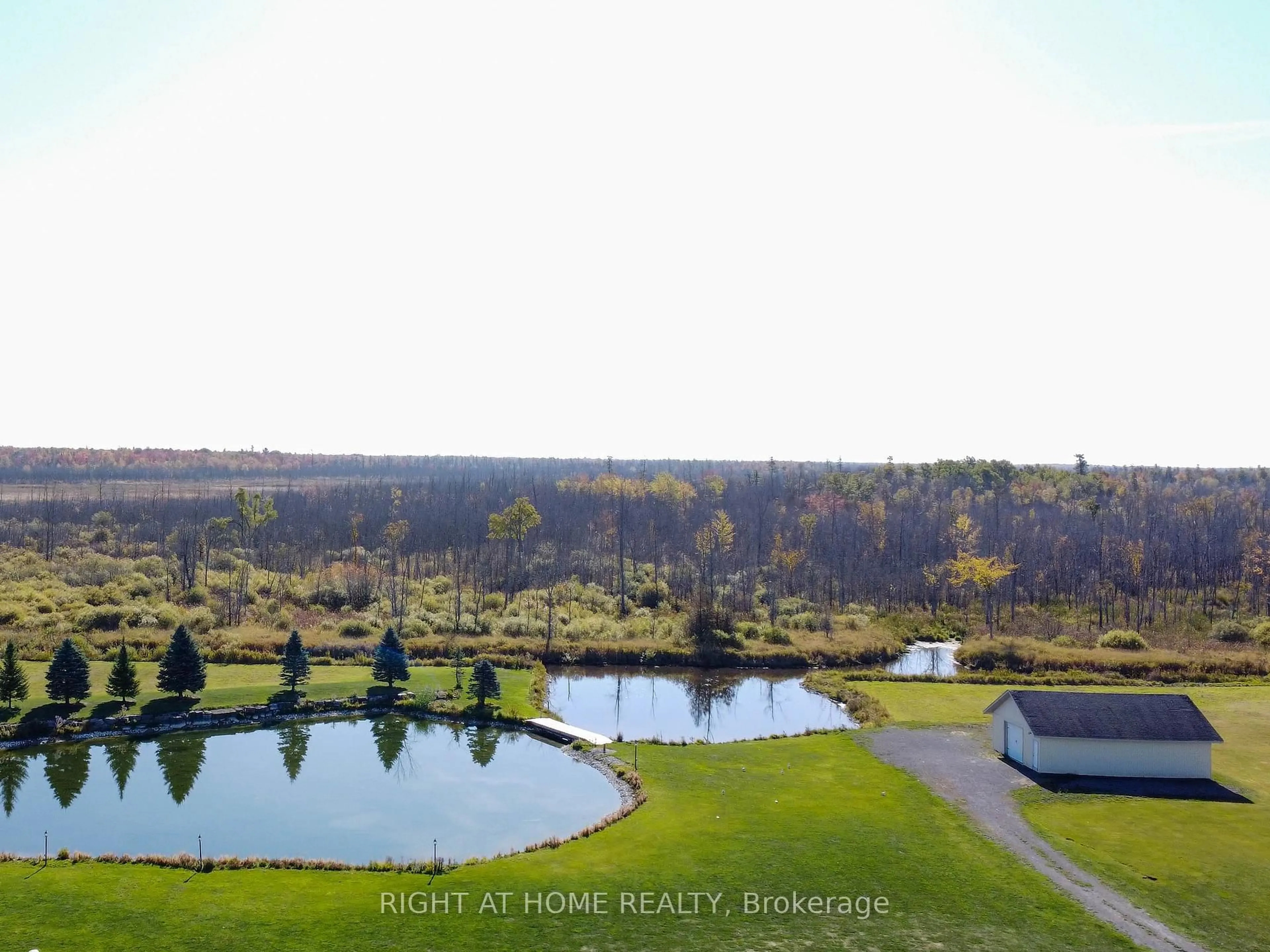 A pic from outside/outdoor area/front of a property/back of a property/a pic from drone, water/lake/river/ocean view for 1165 9TH Line, Carleton Place Ontario K7C 3P2