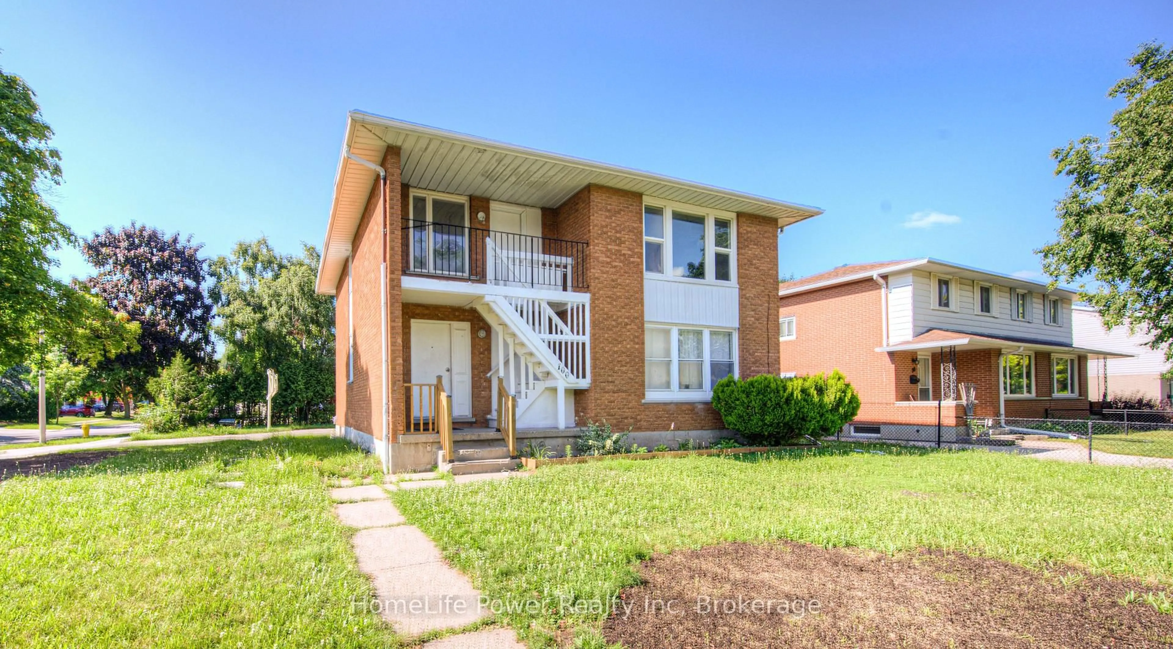 Home with brick exterior material, street for 100 WESTWOOD Rd, Kitchener Ontario N2M 2K6