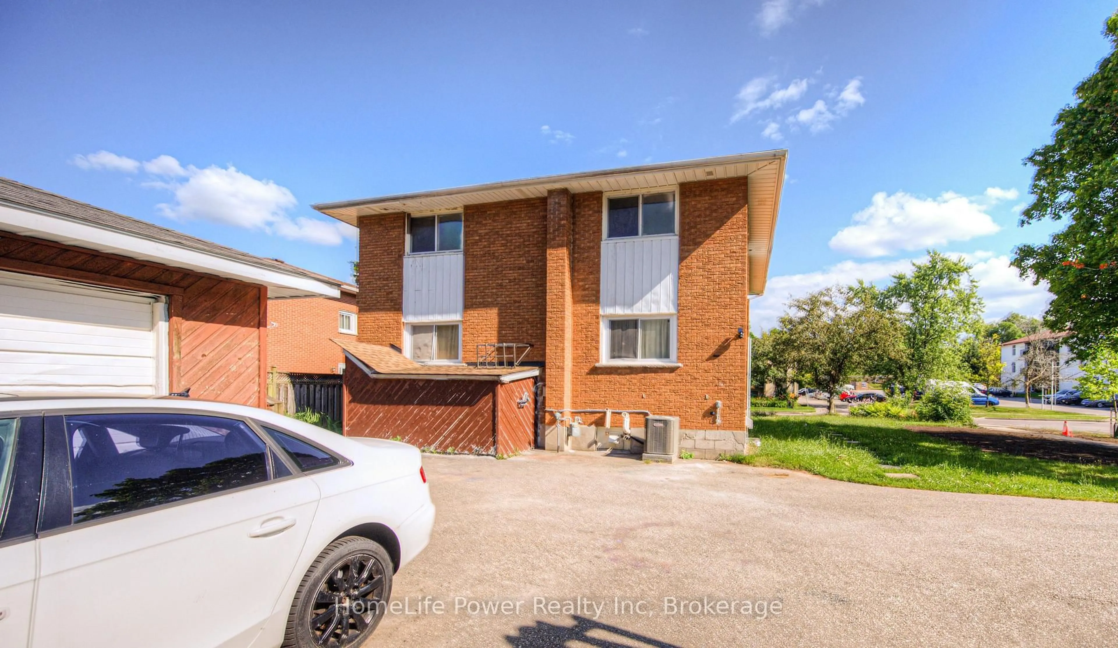 Home with brick exterior material, street for 100 WESTWOOD Rd, Kitchener Ontario N2M 2K6