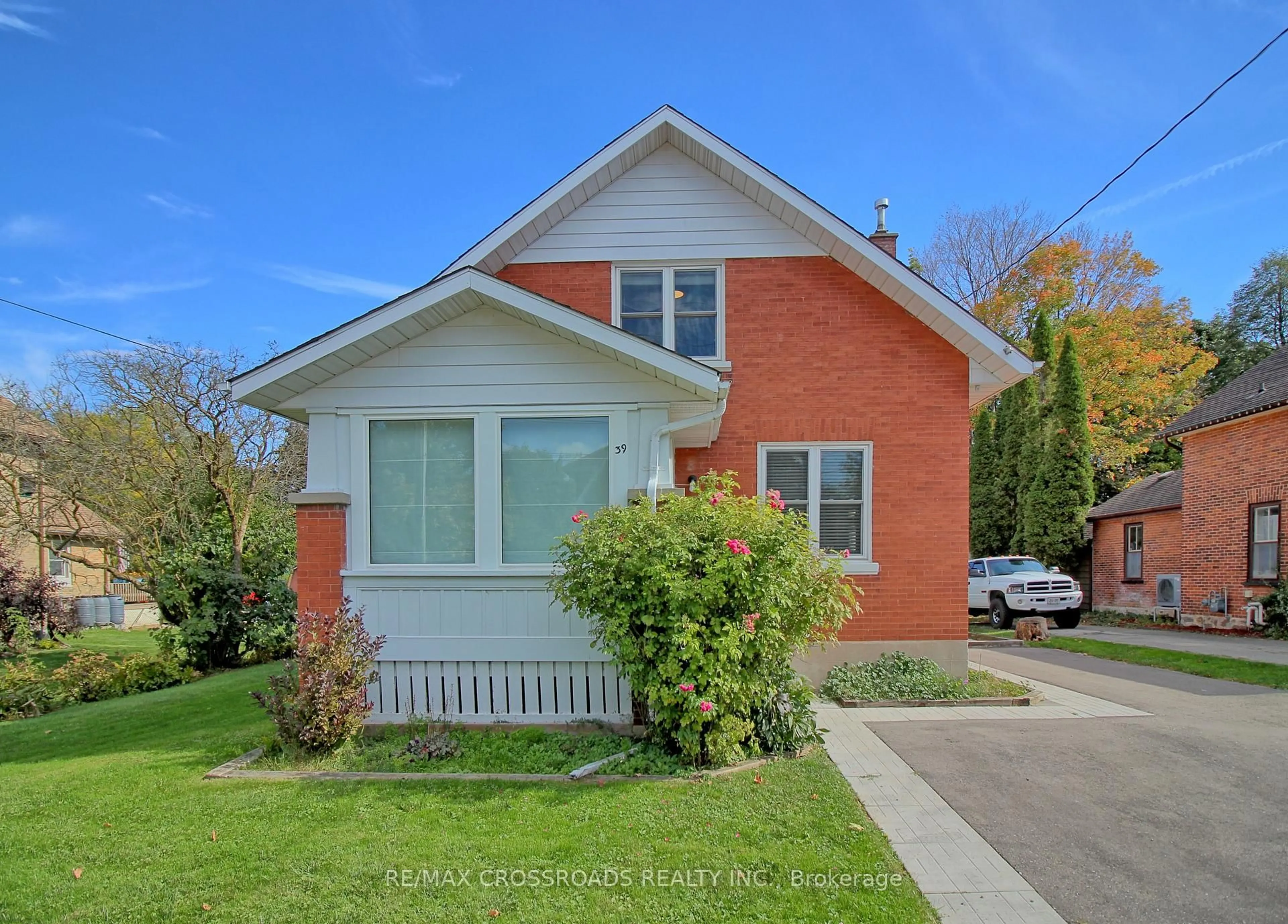 Home with brick exterior material, street for 39 Young St, Woolwich Ontario N0B 2N0