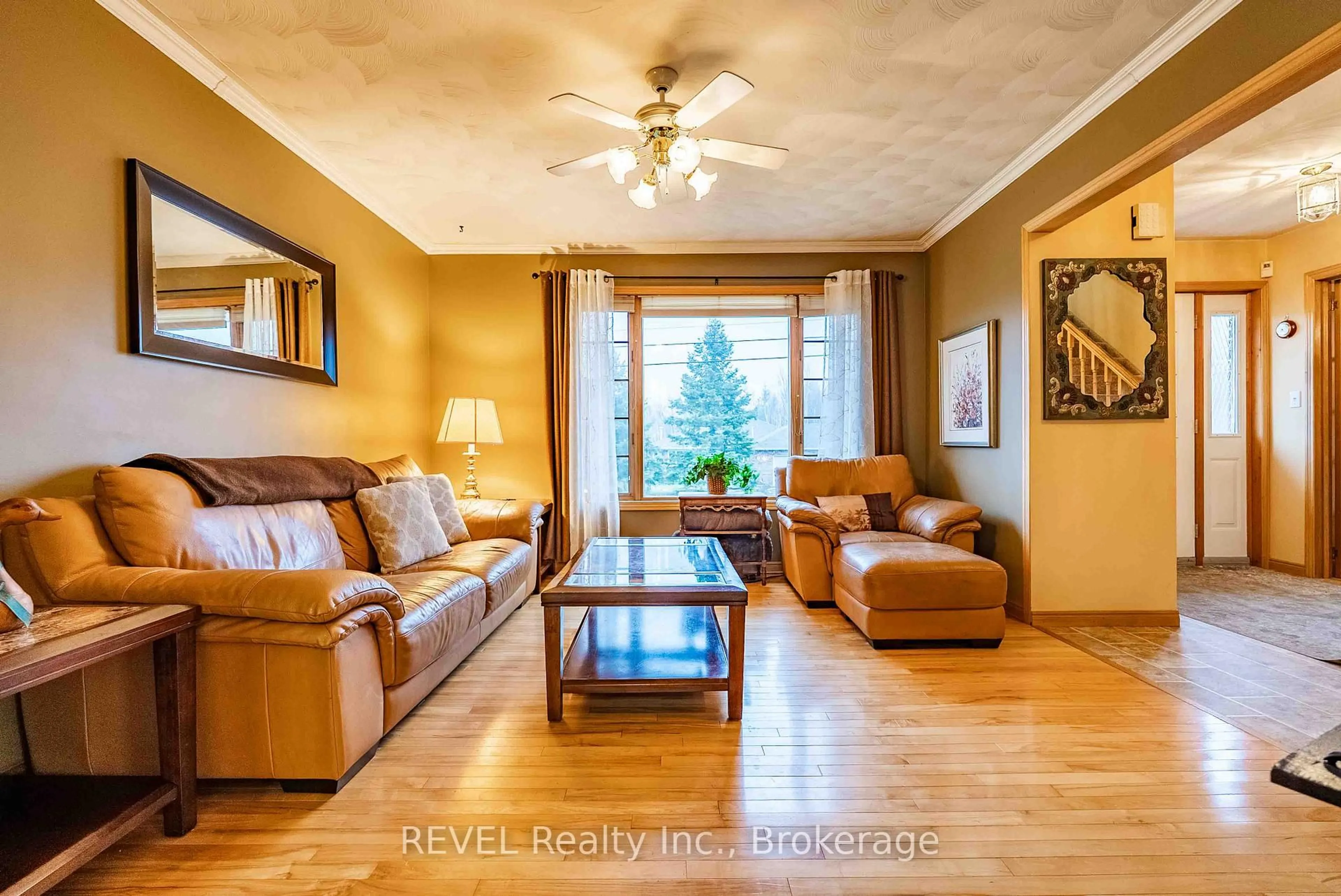 Living room with furniture, wood/laminate floor for 1156 Vera St, Greater Sudbury Ontario P3N 1M6