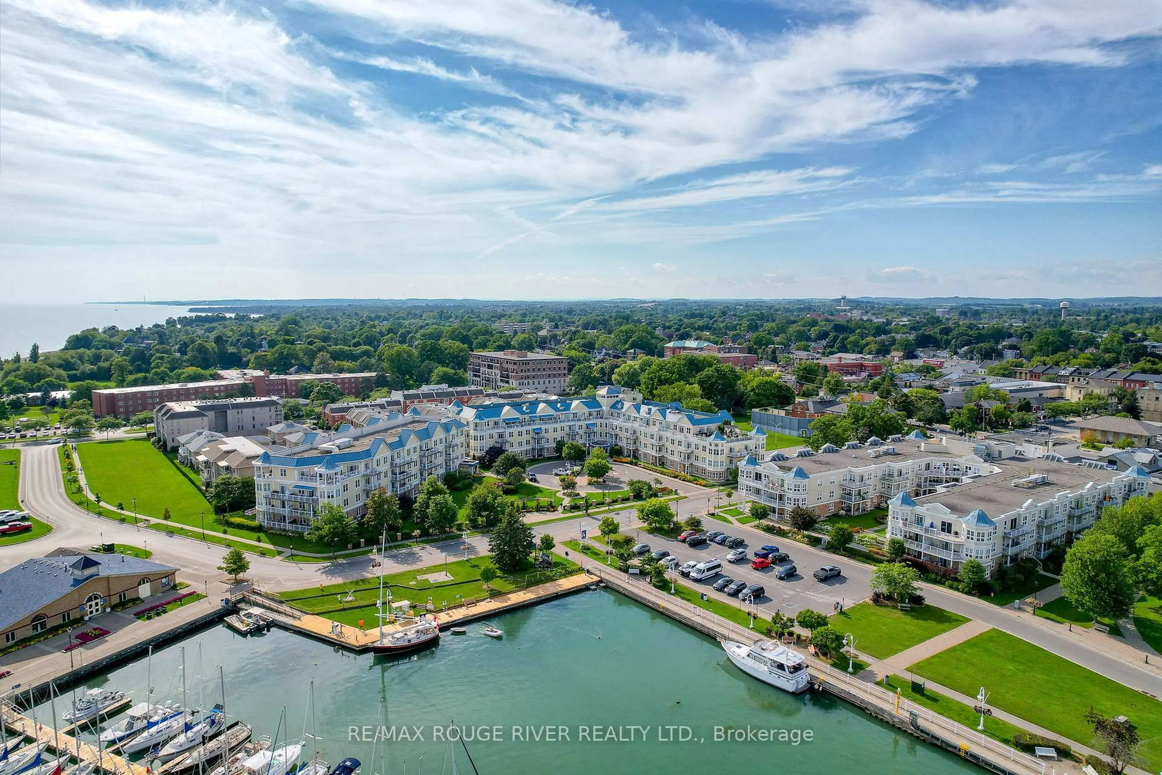 A pic from outside/outdoor area/front of a property/back of a property/a pic from drone, water/lake/river/ocean view for 145 Third St #309, Cobourg Ontario K9A 5X1