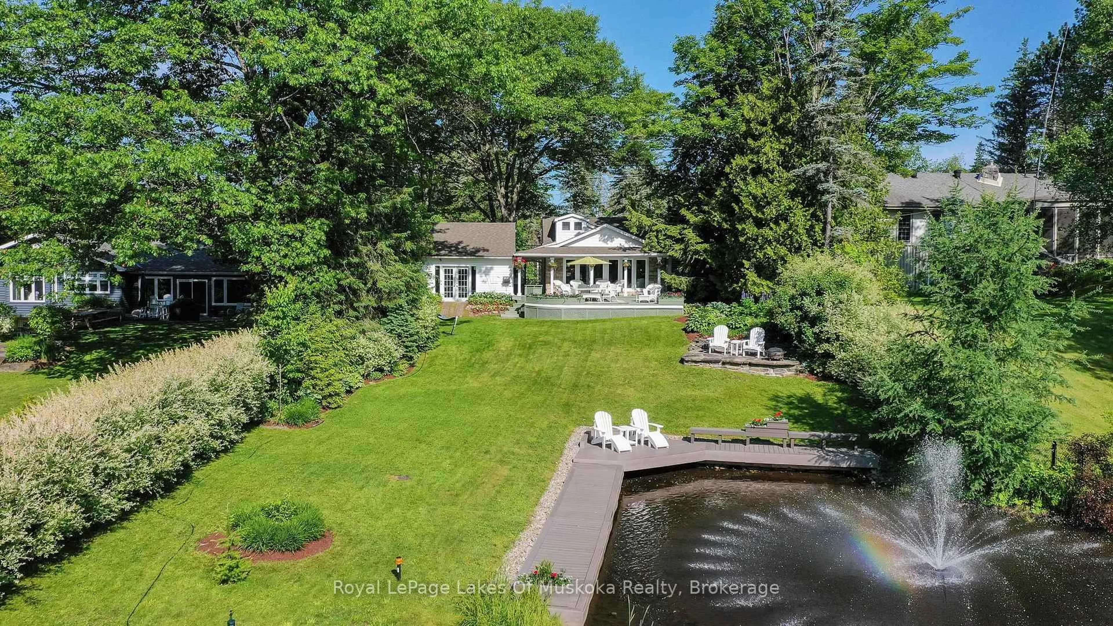 A pic from outside/outdoor area/front of a property/back of a property/a pic from drone, water/lake/river/ocean view for 9 Mountview Ave, Huntsville Ontario P1H 1G8