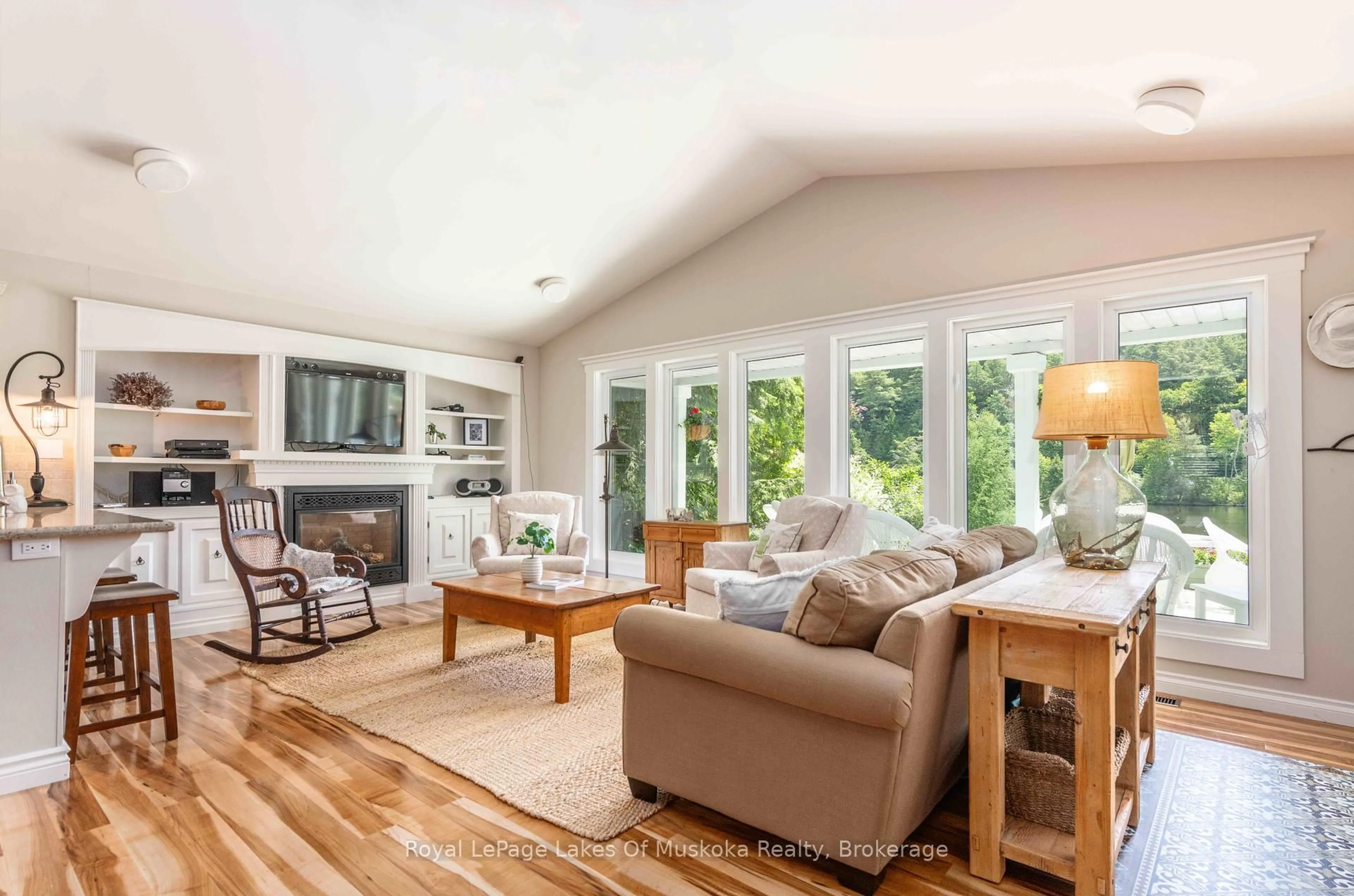 Living room with furniture, wood/laminate floor for 9 Mountview Ave, Huntsville Ontario P1H 1G8