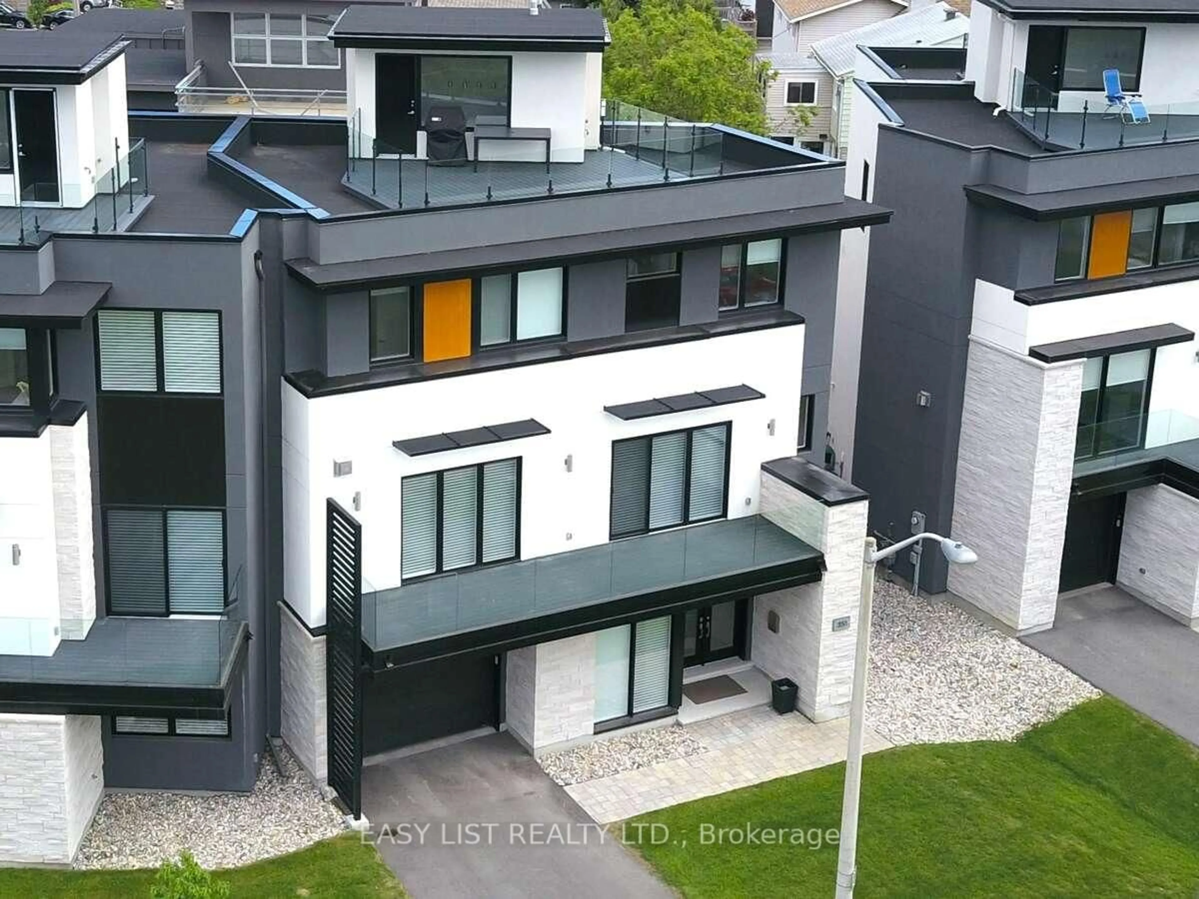 A pic from outside/outdoor area/front of a property/back of a property/a pic from drone, unknown for 351 Dominion Ave, Ottawa Ontario K2A 2H1