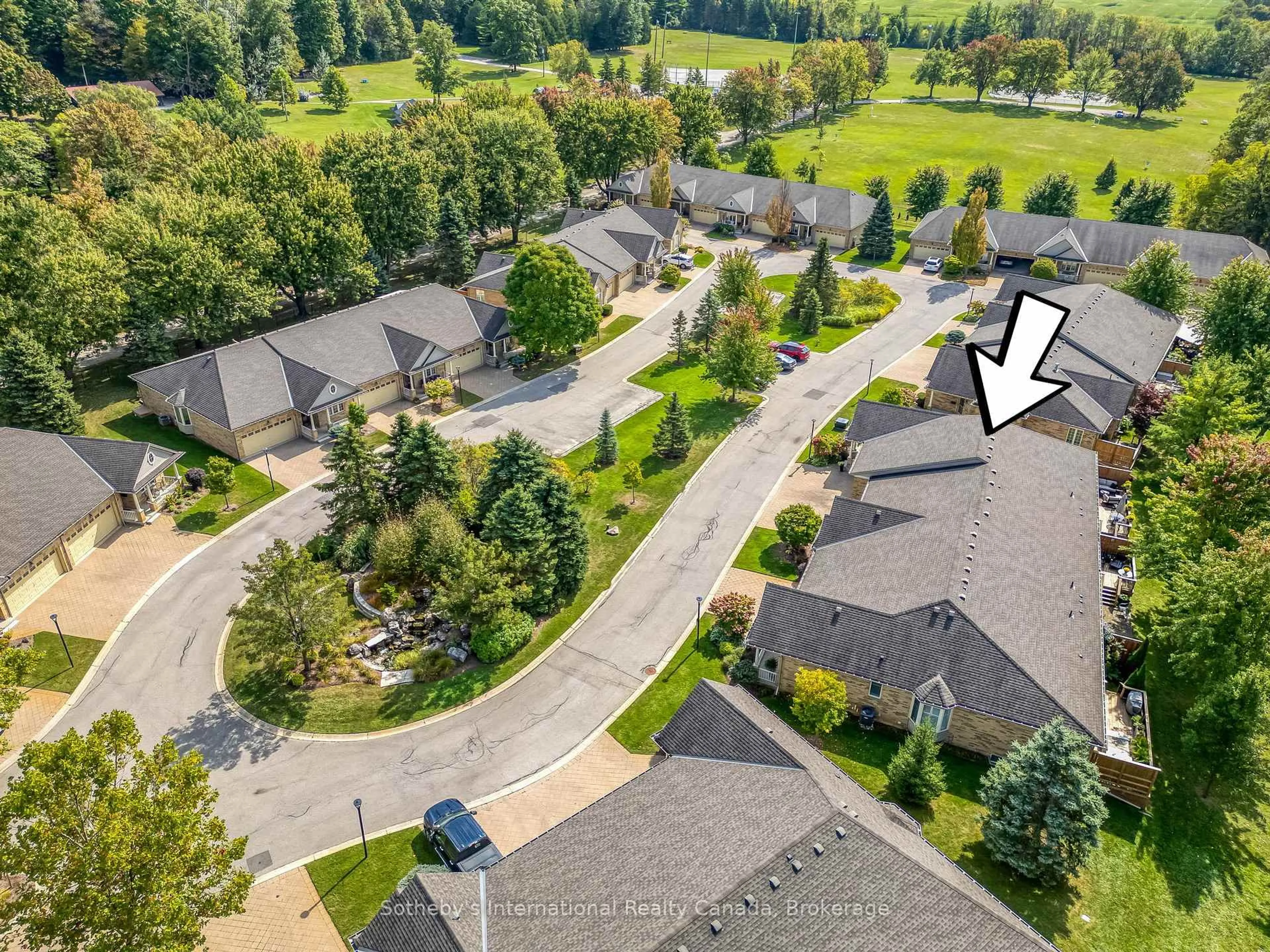 A pic from outside/outdoor area/front of a property/back of a property/a pic from drone, street for 21 St Johns Dr #6, Middlesex Centre Ontario N0M 1C0