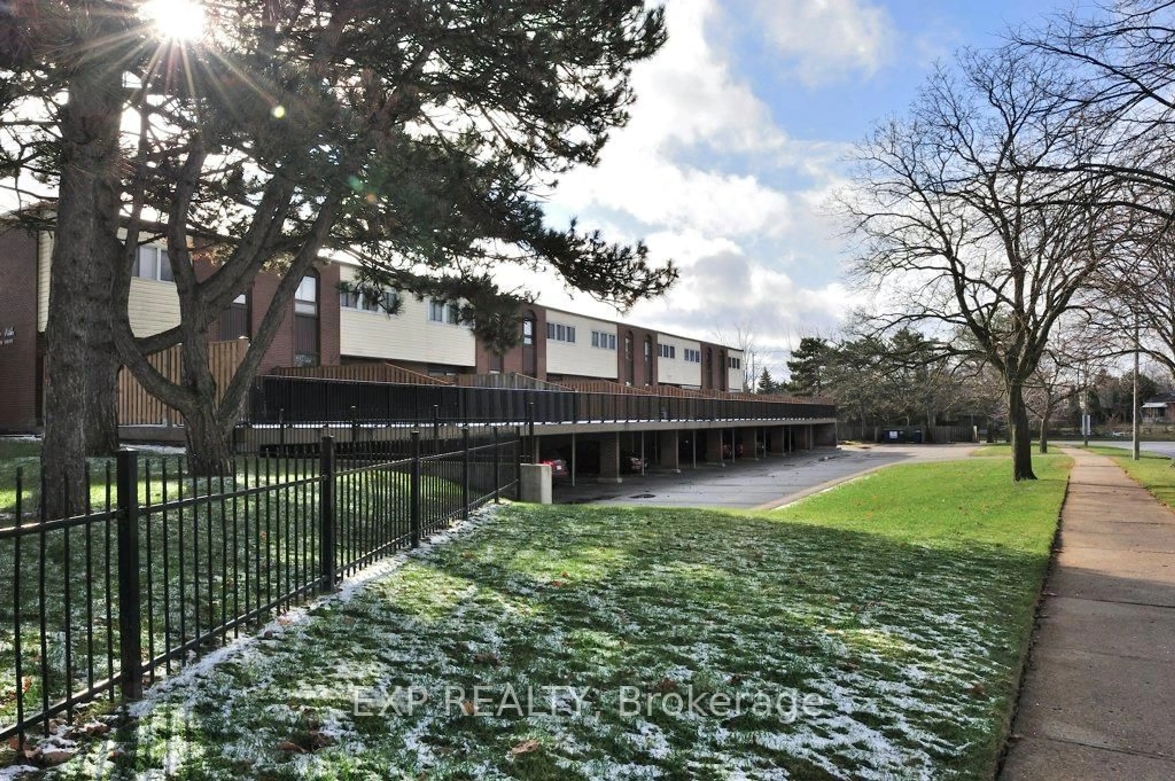 A pic from outside/outdoor area/front of a property/back of a property/a pic from drone, street for 17 Gibson Dr #2, Kitchener Ontario N2B 2P3