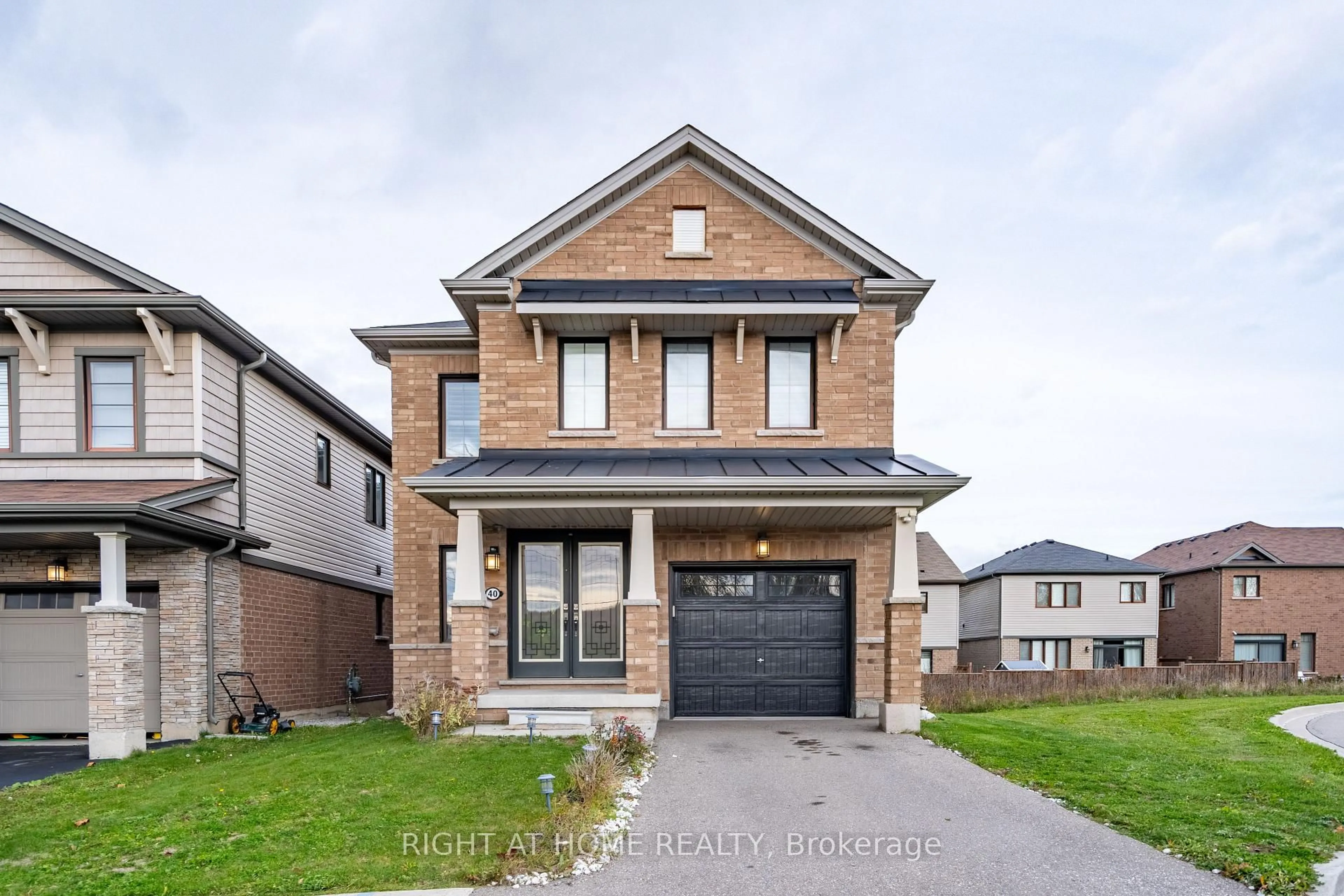 Home with brick exterior material, street for 40 Hedges Cres, Hamilton Ontario L8J 0K8