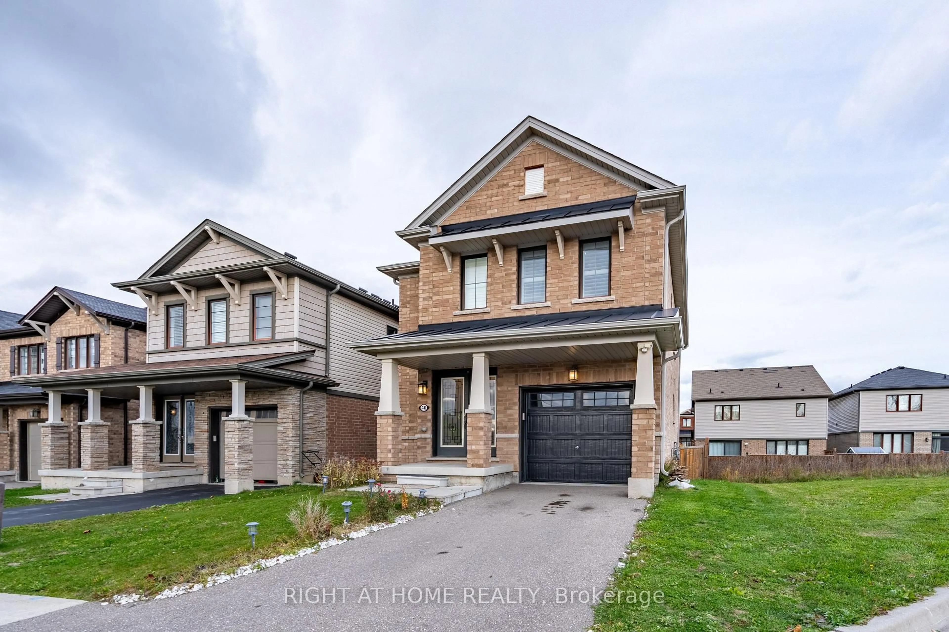 Home with brick exterior material, street for 40 Hedges Cres, Hamilton Ontario L8J 0K8
