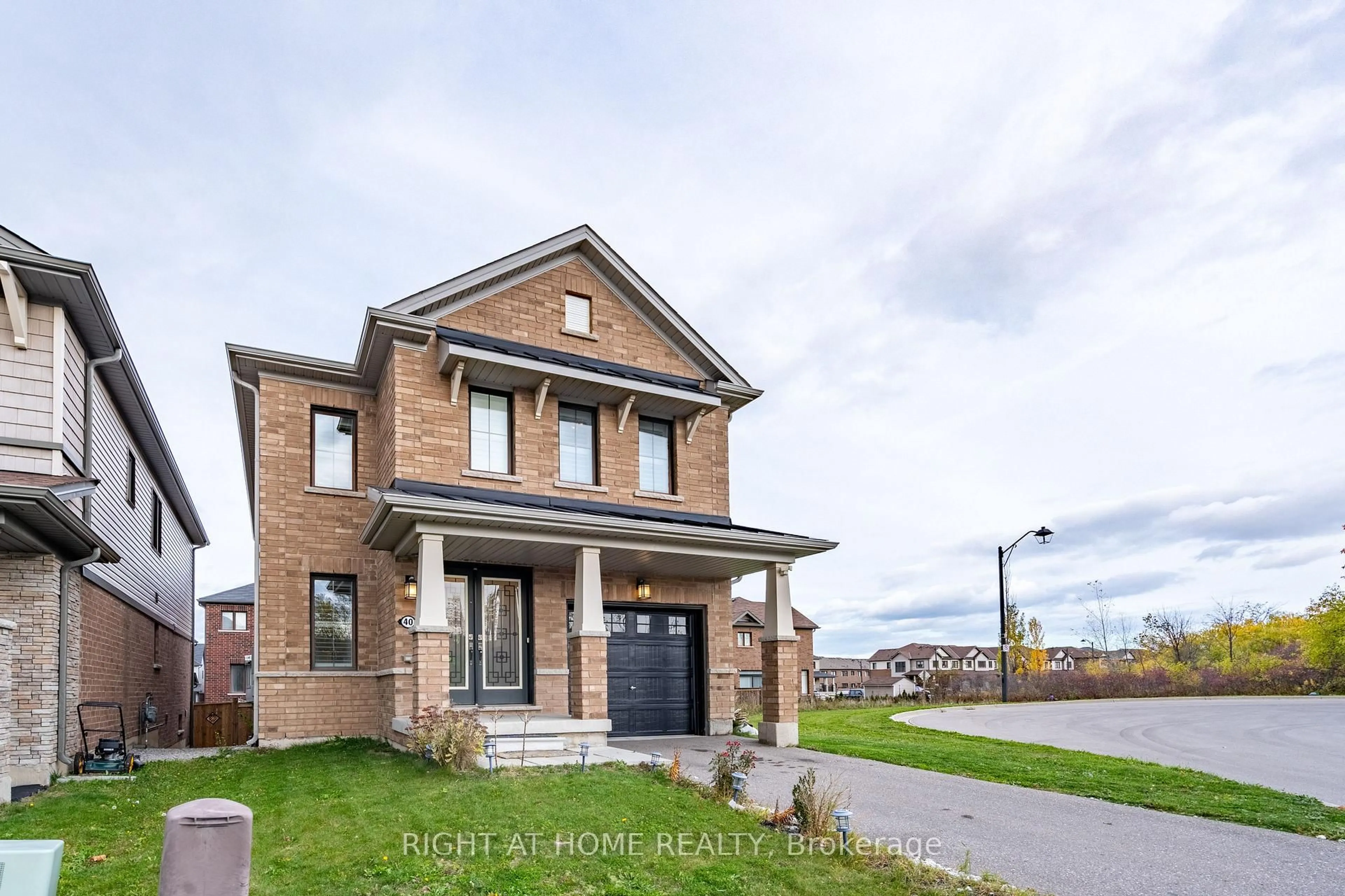 Home with brick exterior material, street for 40 Hedges Cres, Hamilton Ontario L8J 0K8