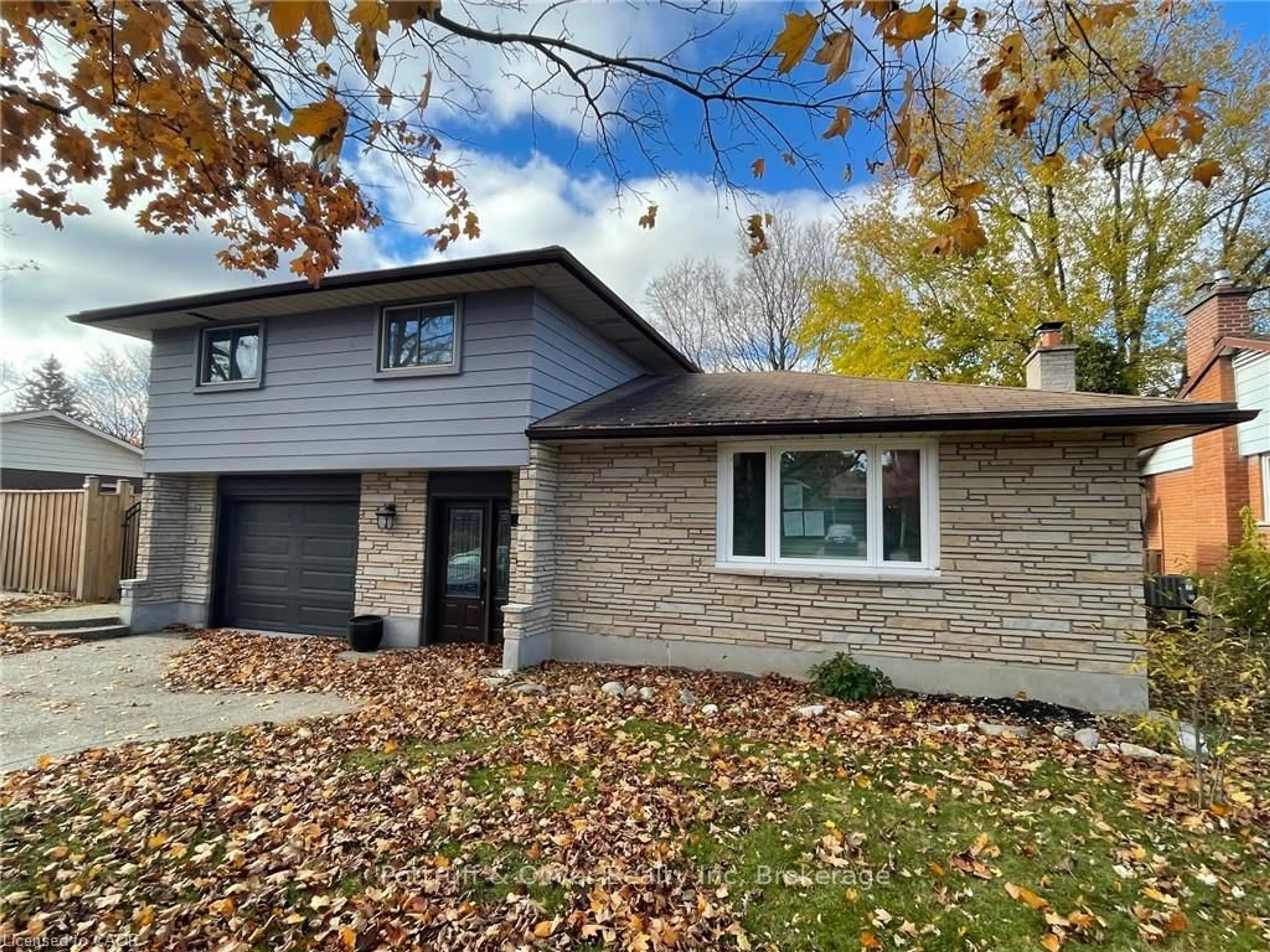 Home with brick exterior material, street for 124 Southwood Dr, Cambridge Ontario N1S 3S2