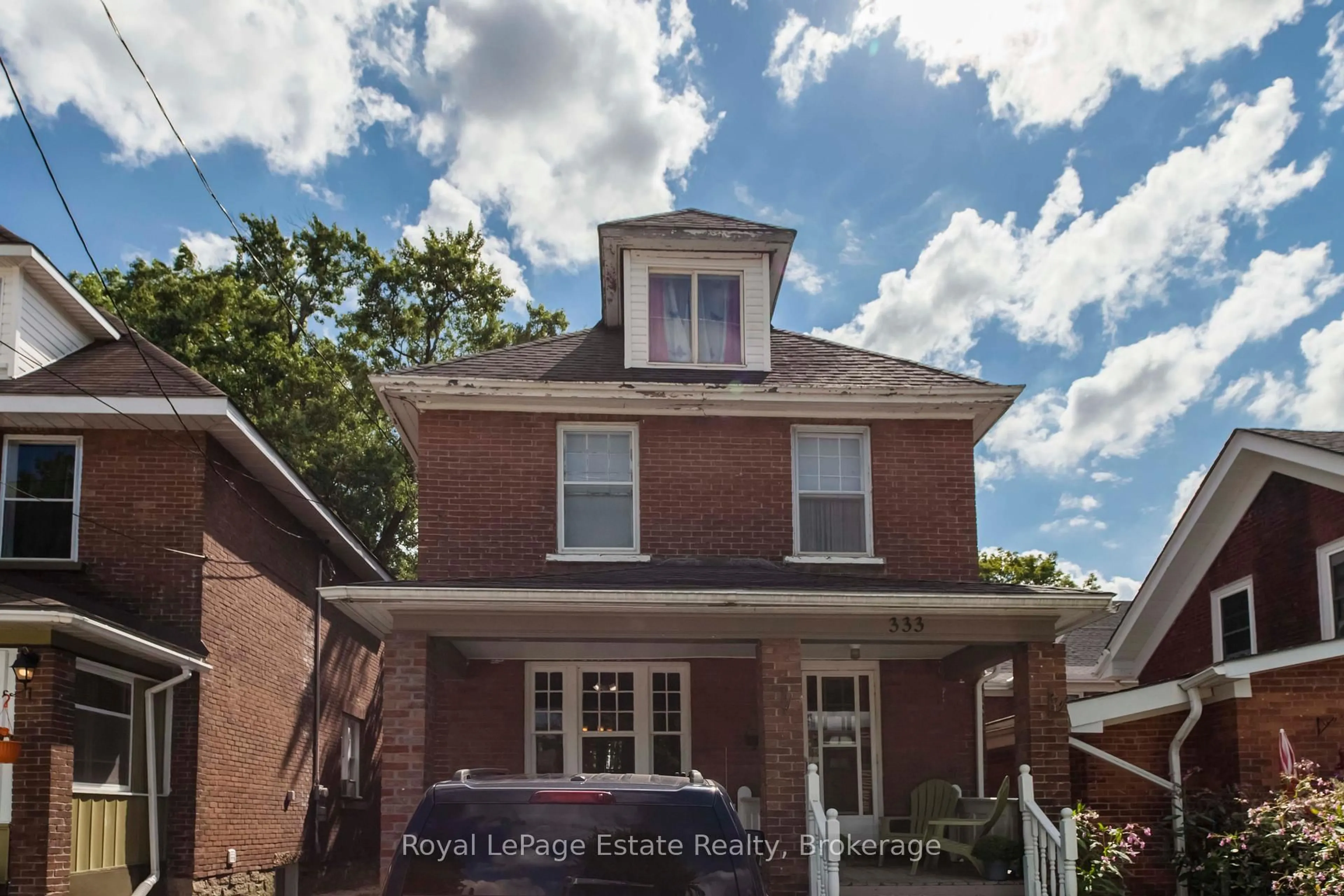 Home with brick exterior material, street for 333 12th St, Owen Sound Ontario N4K 1W1