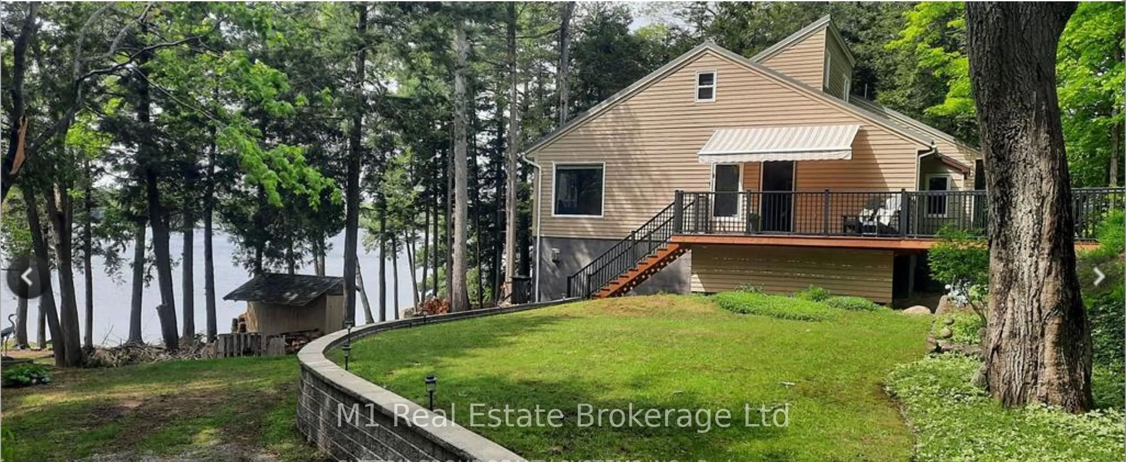 A pic from outside/outdoor area/front of a property/back of a property/a pic from drone, water/lake/river/ocean view for 1581 B Lake Joseph Rd Rd, Seguin Ontario P0C 1H0