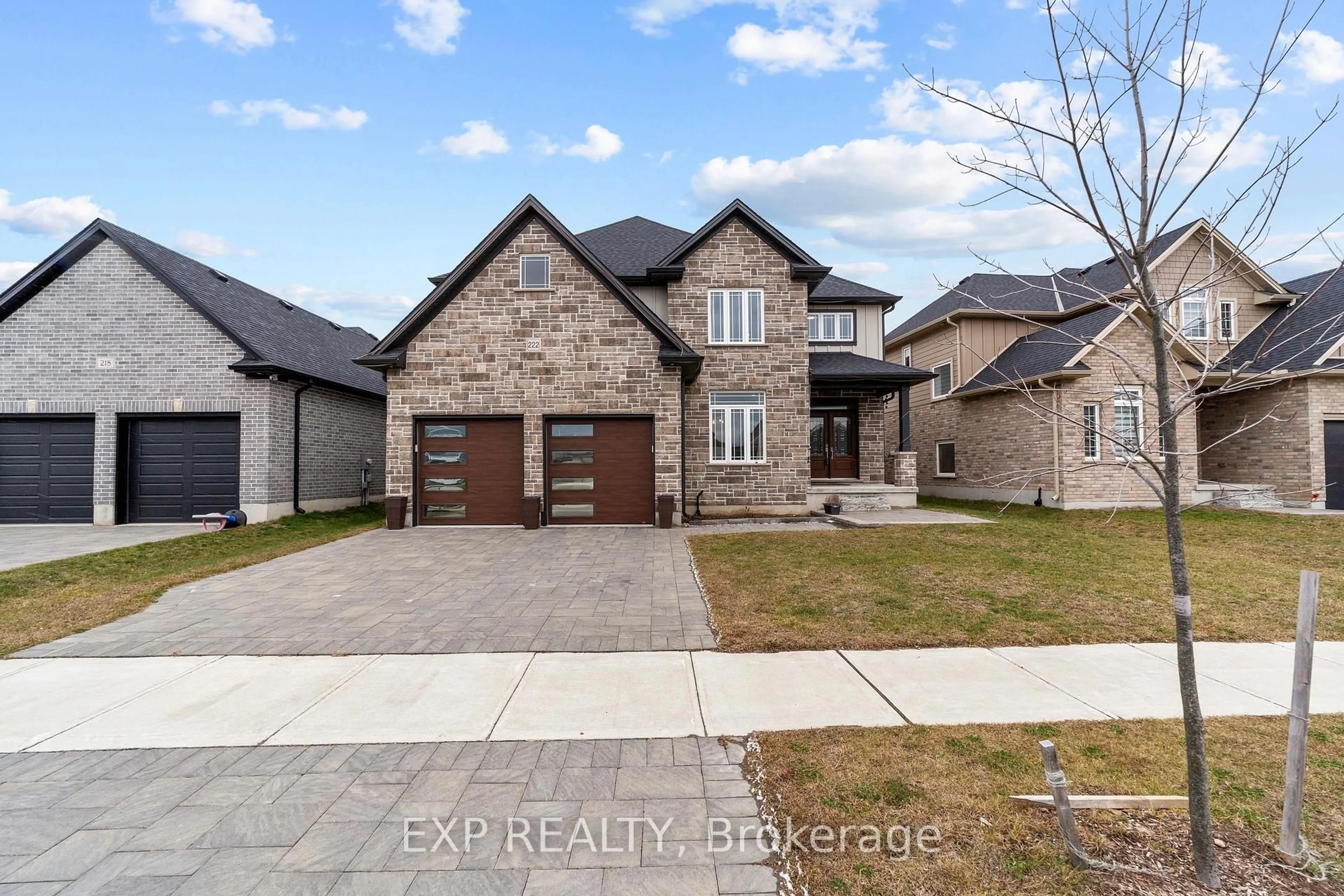 Home with brick exterior material, street for 222 Boardwalk Way, Thames Centre Ontario N0L 1G2