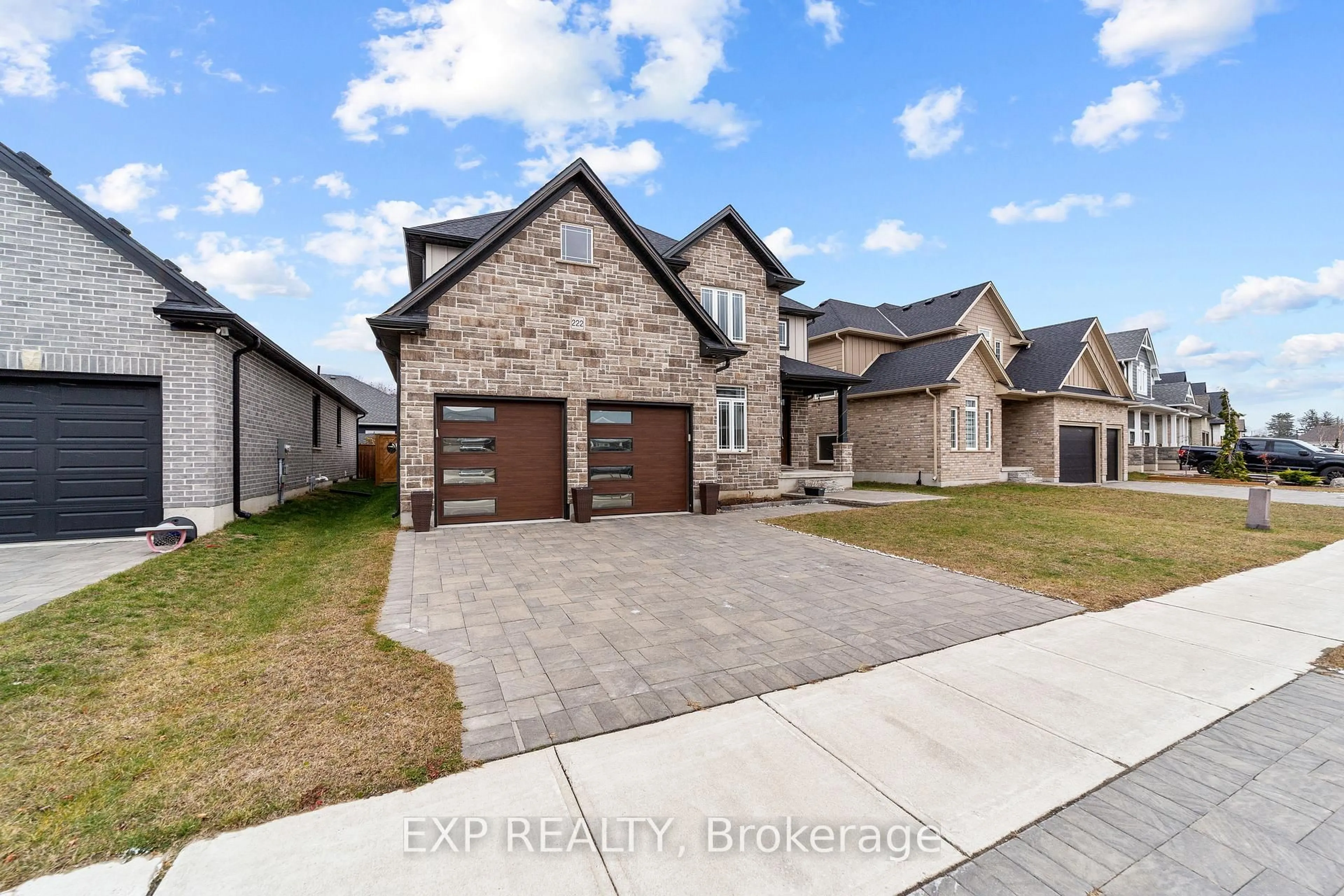 Home with brick exterior material, street for 222 Boardwalk Way, Thames Centre Ontario N0L 1G2
