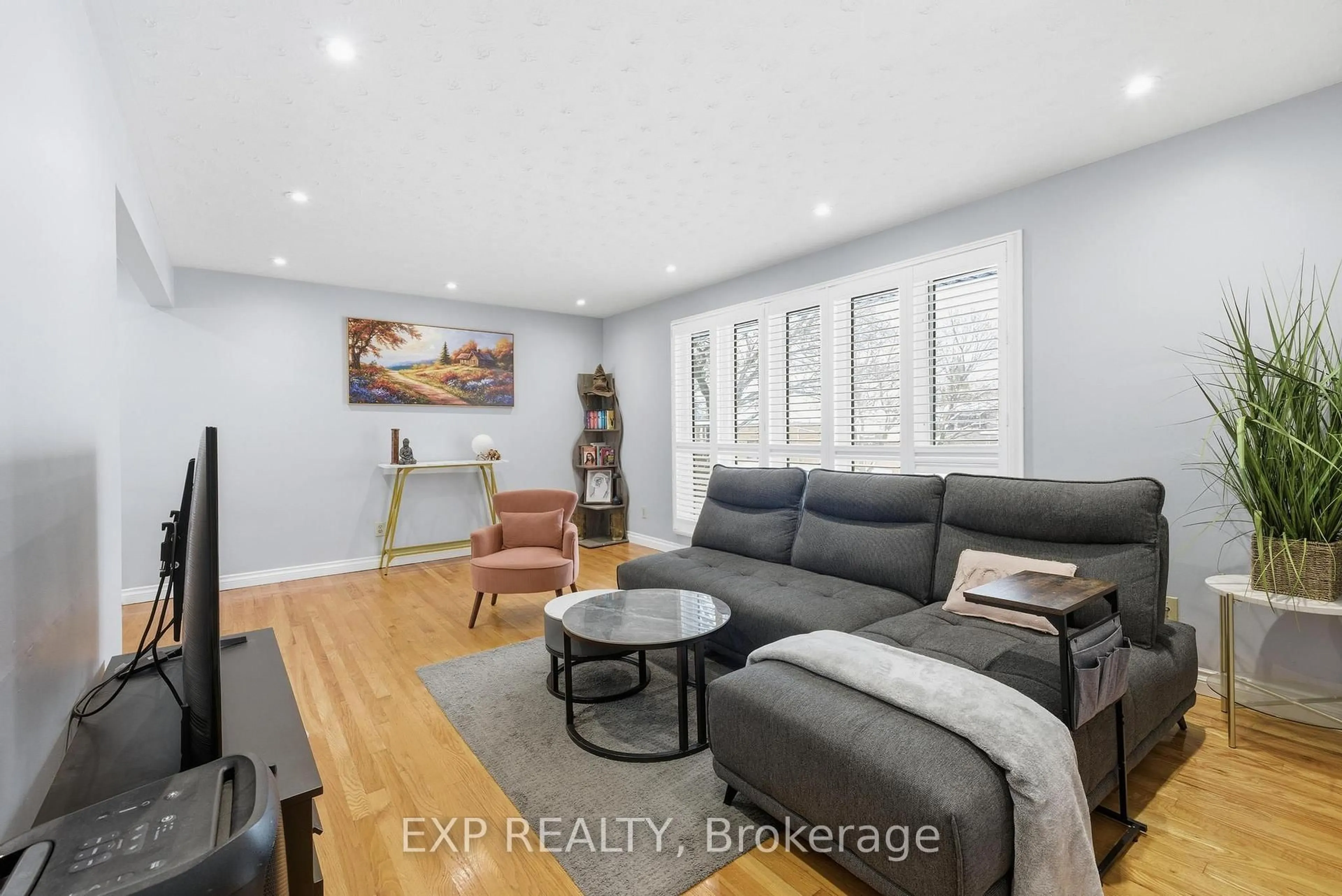 Living room with furniture, wood/laminate floor for 364 Roselawn Pl, Waterloo Ontario N2L 5P1