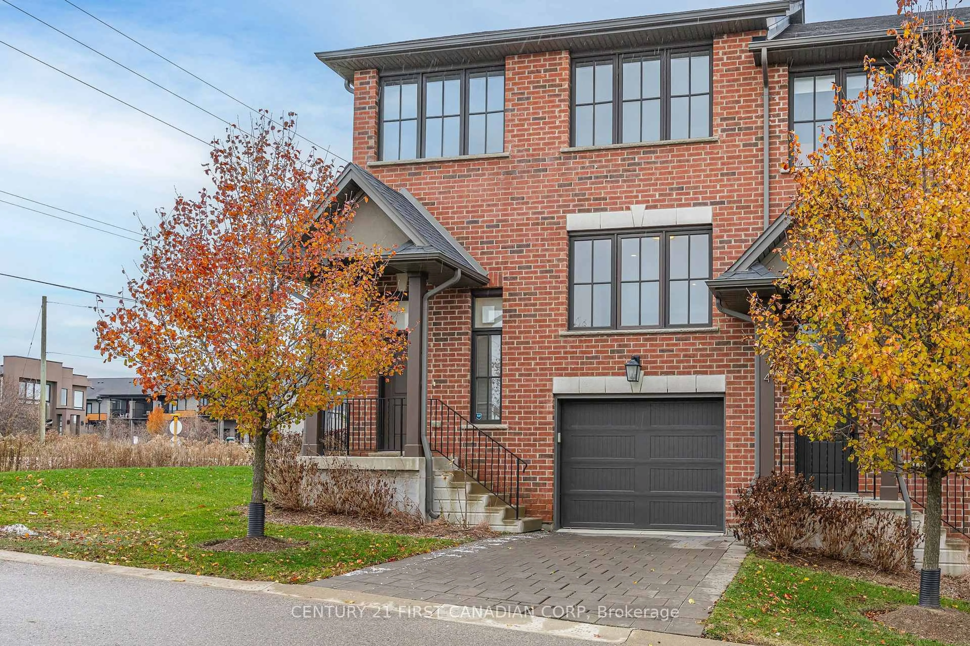 Home with brick exterior material, street for 555 Sunningdale Rd #2, London North Ontario N5X 4B3