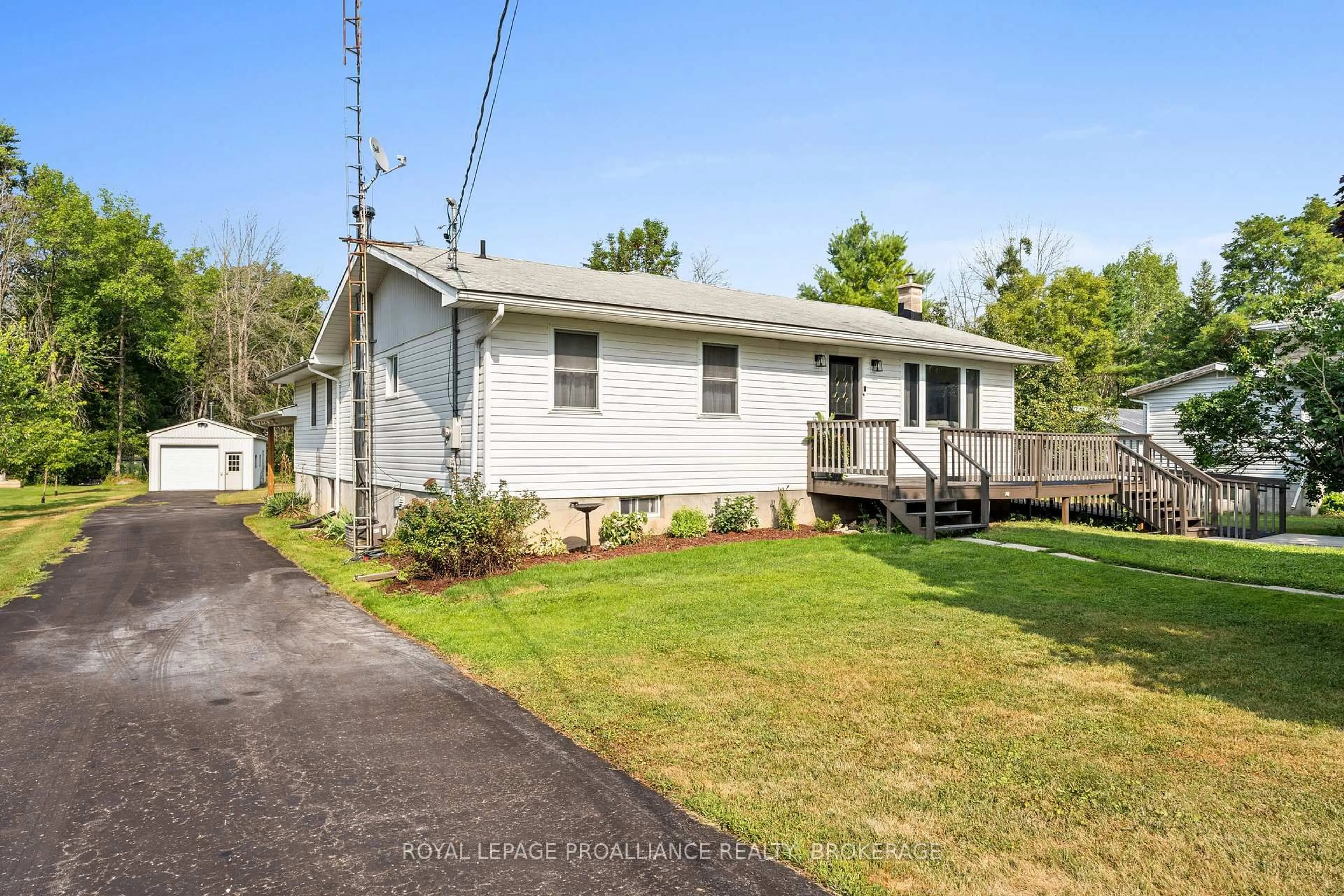 Home with vinyl exterior material, street for 1544 Lake Rd, Kaladar Ontario K0K 1Z0