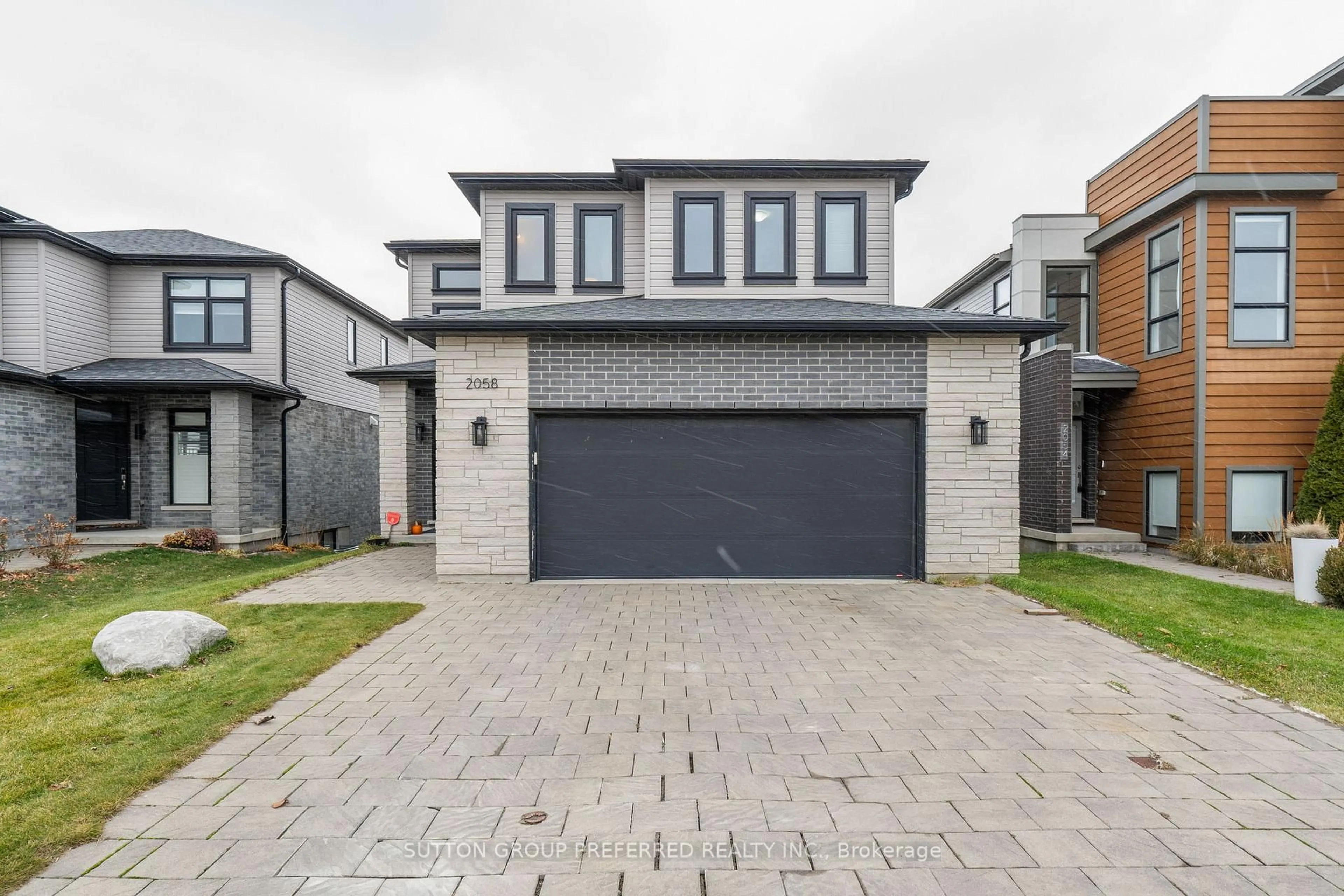 Home with brick exterior material, street for 2058 Wateroak Dr, London North Ontario N6G 0P9