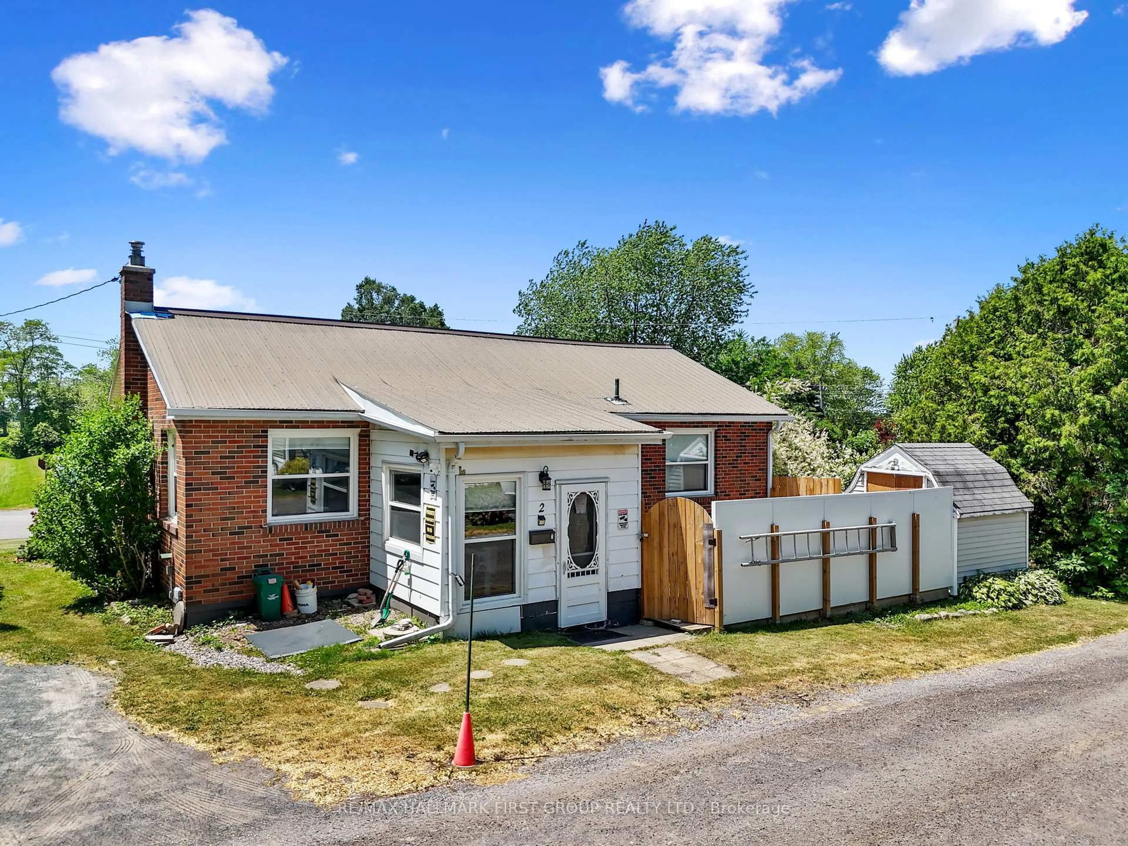 A pic from outside/outdoor area/front of a property/back of a property/a pic from drone, street for 2 Park Lane, Hamilton Township Ontario K9A 0X9