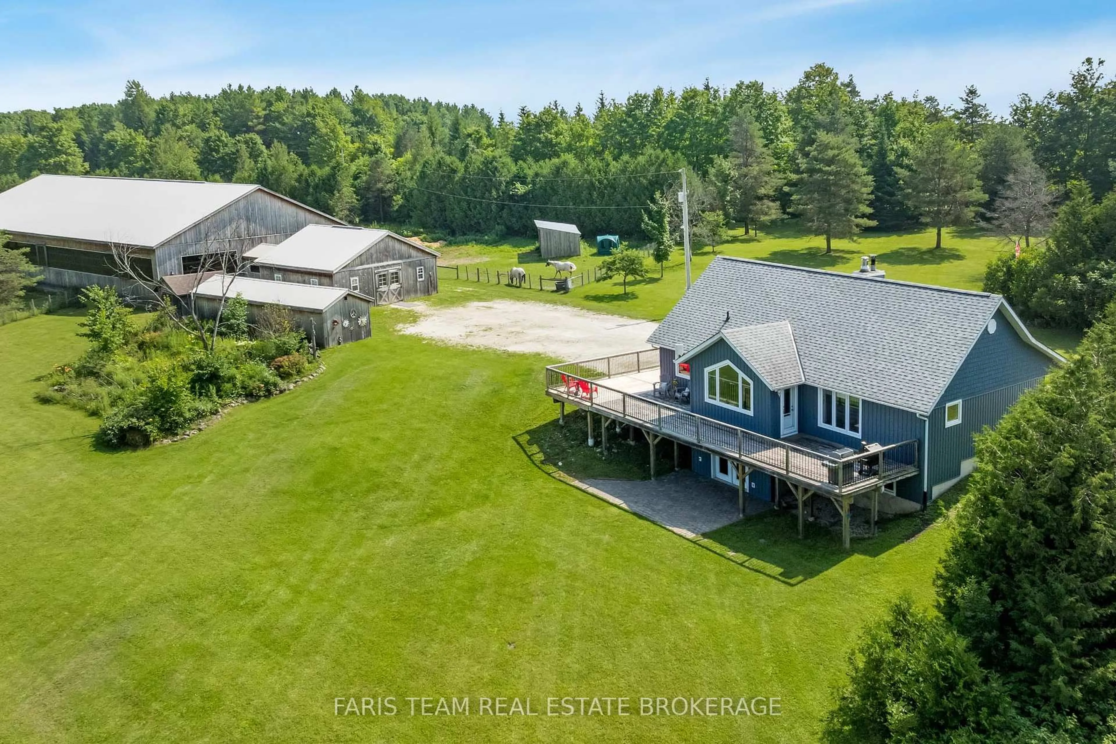 A pic from outside/outdoor area/front of a property/back of a property/a pic from drone, water/lake/river/ocean view for 735519 West Back Line, West Grey Ontario N0C 1H0