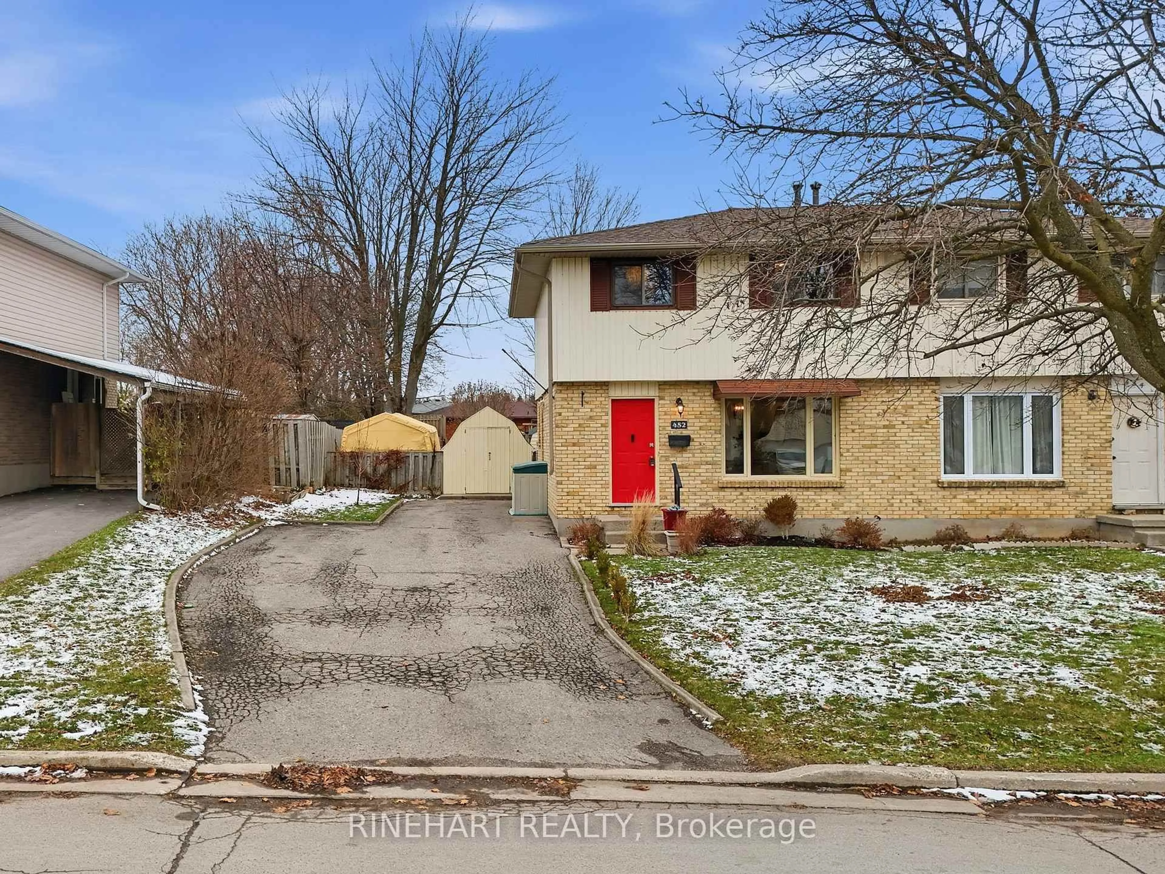 A pic from outside/outdoor area/front of a property/back of a property/a pic from drone, street for 452 Stockton St, London South Ontario N6C 3B7